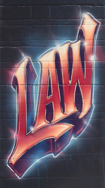 Bold graffiti art on a city wall in bright colors Free Premium Stock Image - stock photo