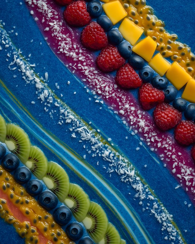 Bright fruit arrangement on blue background Free Premium Stock Image - stock photo