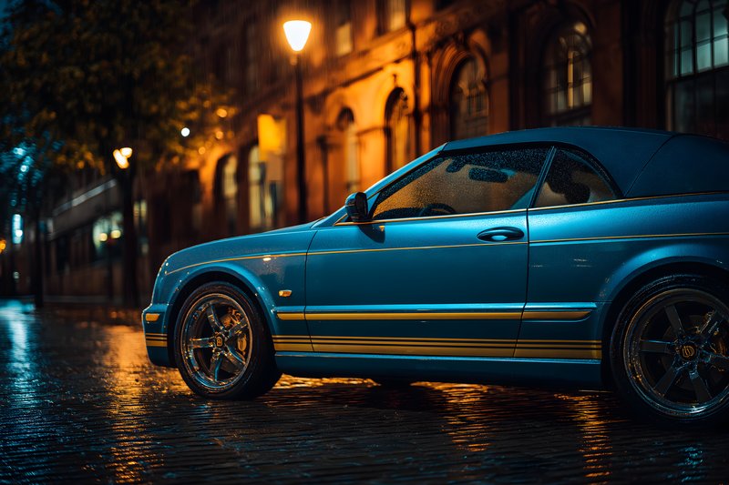 Blue convertible car parked in city at night in the rain Free Premium Stock Photo - stock photo