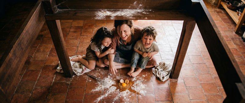 Mother and children having fun while baking in a kitchen Premium Stock Photo - stock photo