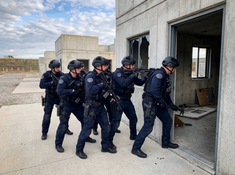 SWAT team conducts tactical training exercise at facility Premium Stock Image - stock photo