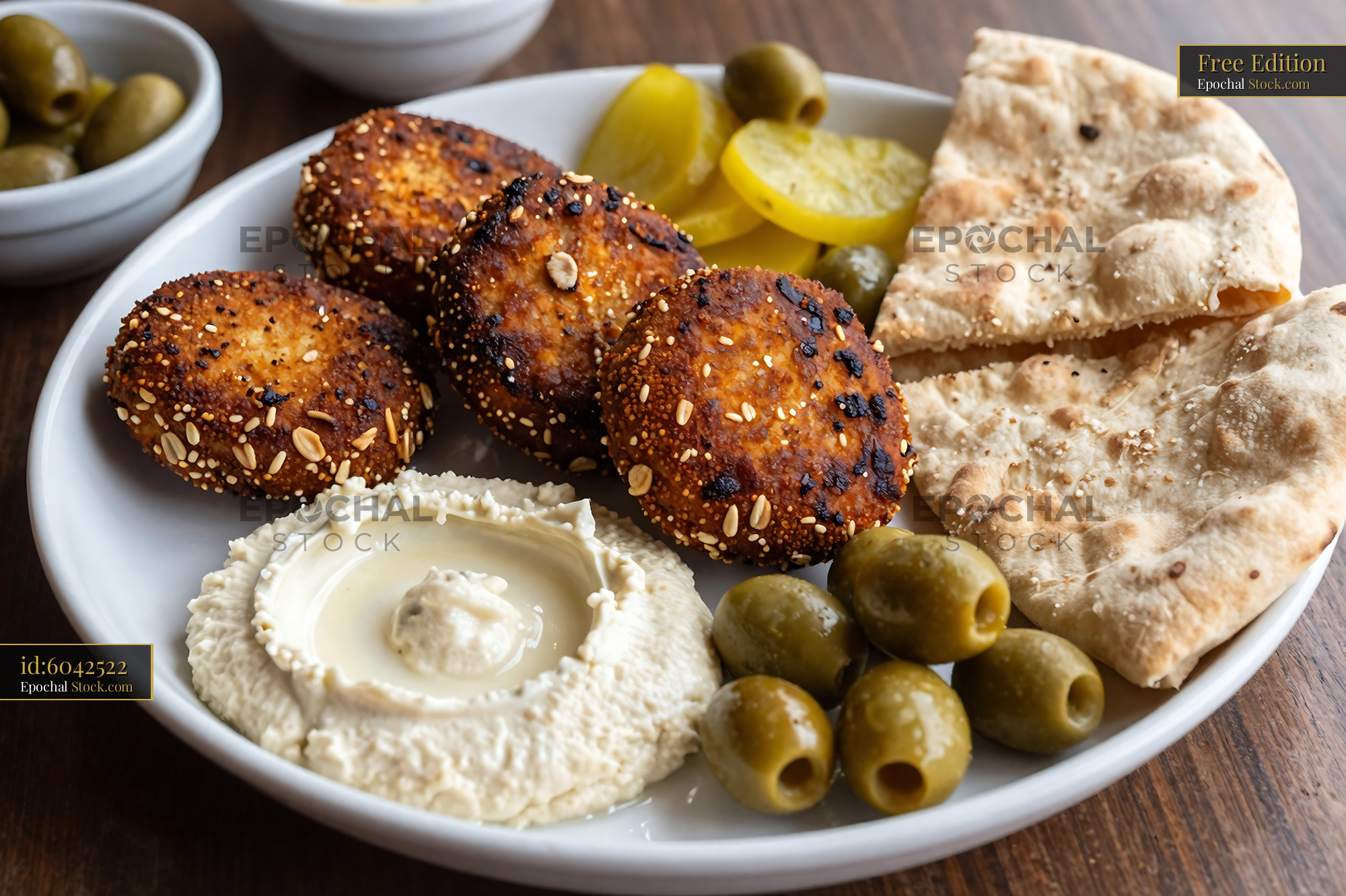 Crispy Goetta Sesame Patties with Hummus - stock photo