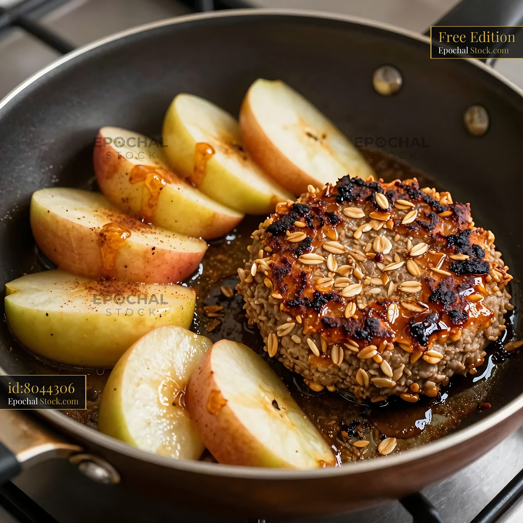 Goetta Seared with Apple Slices in Skillet - stock photo