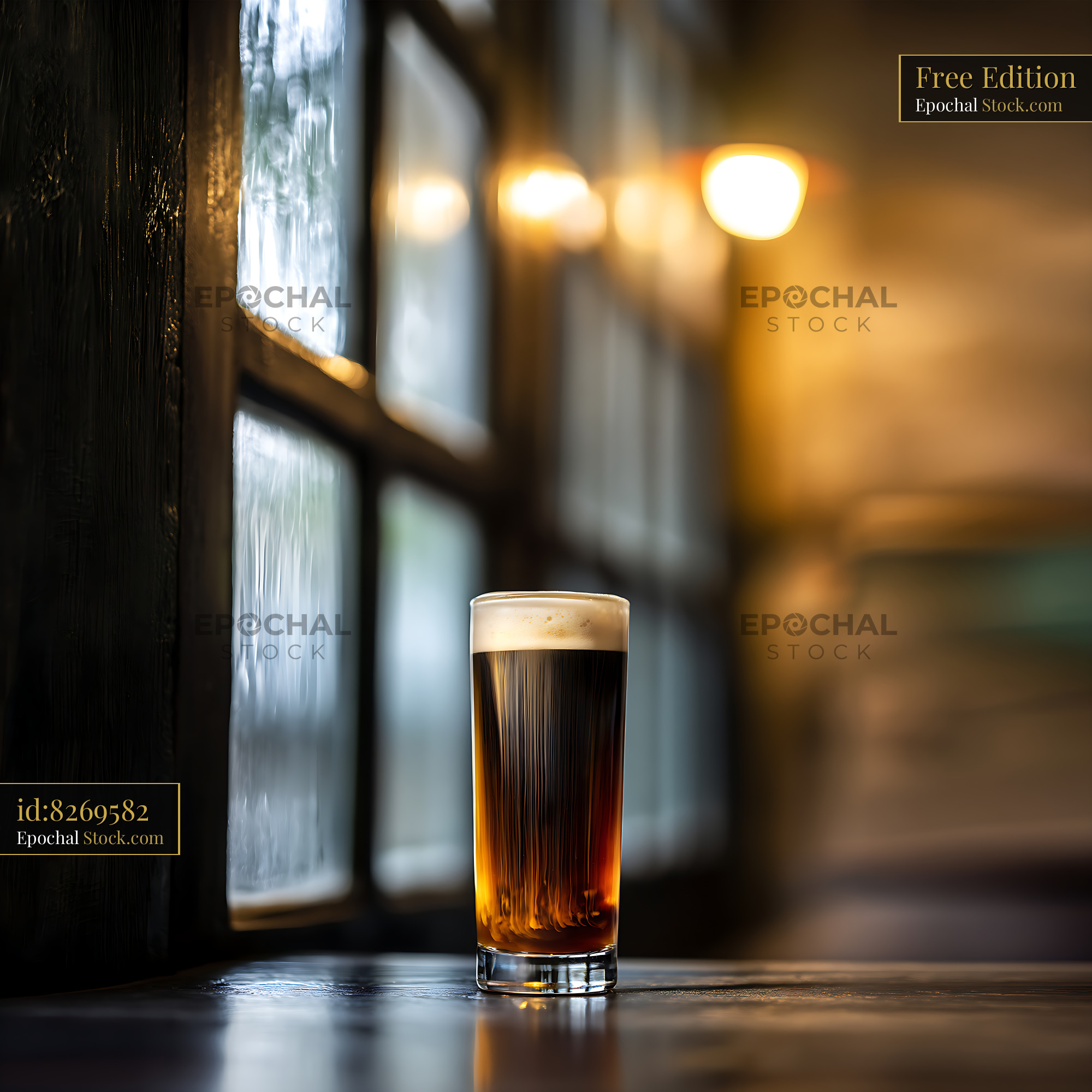 Nitro Caramel Coffee With Creamy Head in Caf? - stock photo