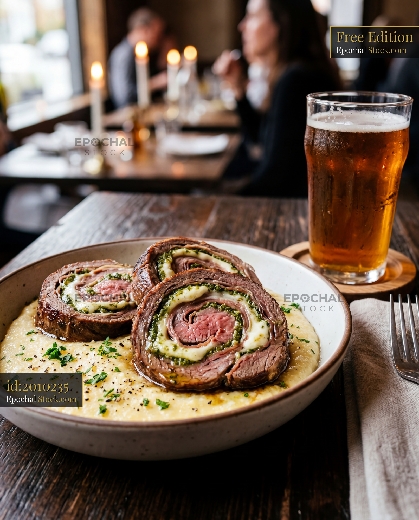 Herb-Stuffed Beef Roulade with IPA Beer Pairing - stock photo