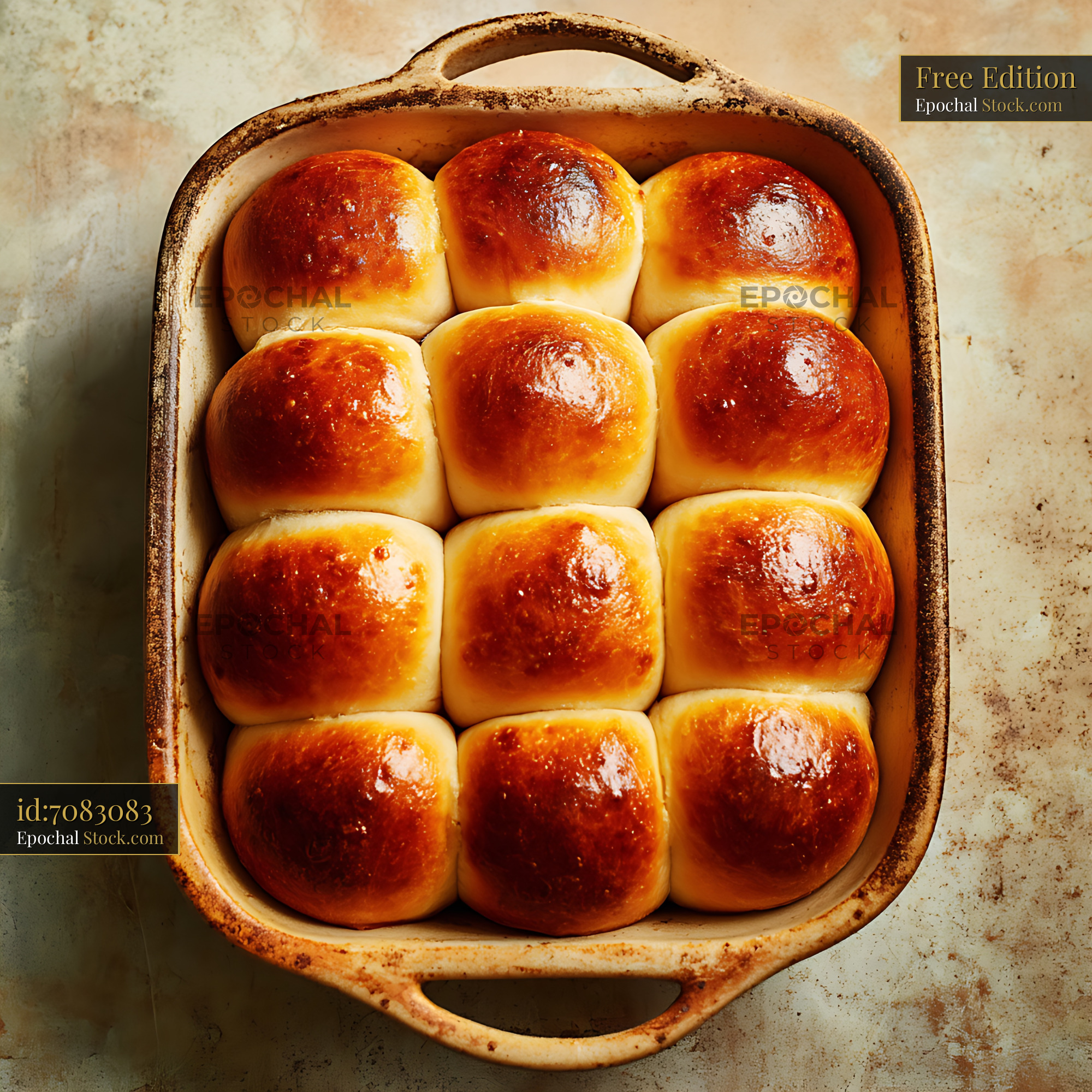 Golden Dinner Rolls in Rustic Baking Pan - stock photo