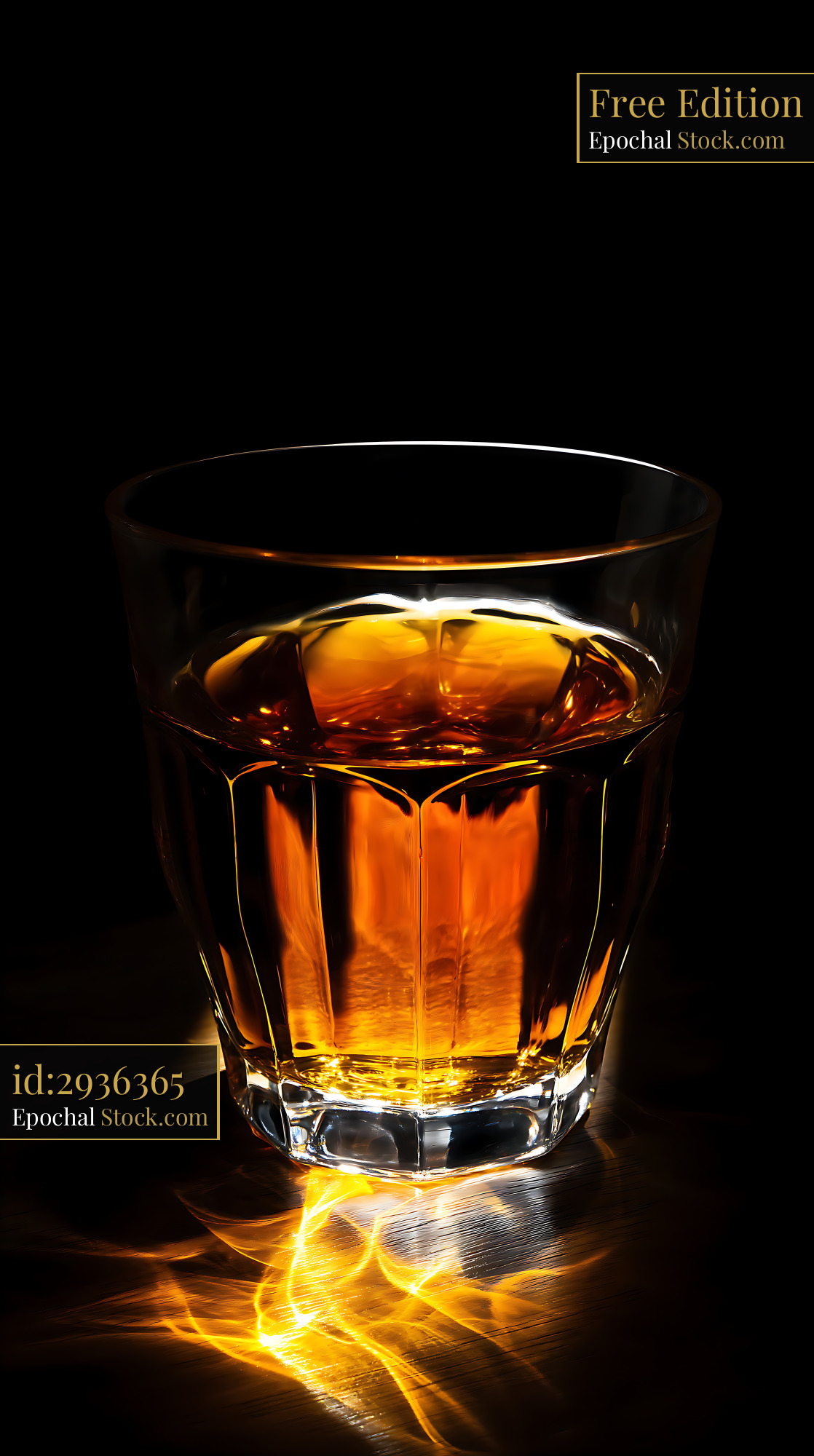 Whiskey Rocks Glass with Dramatic Studio Light - stock photo