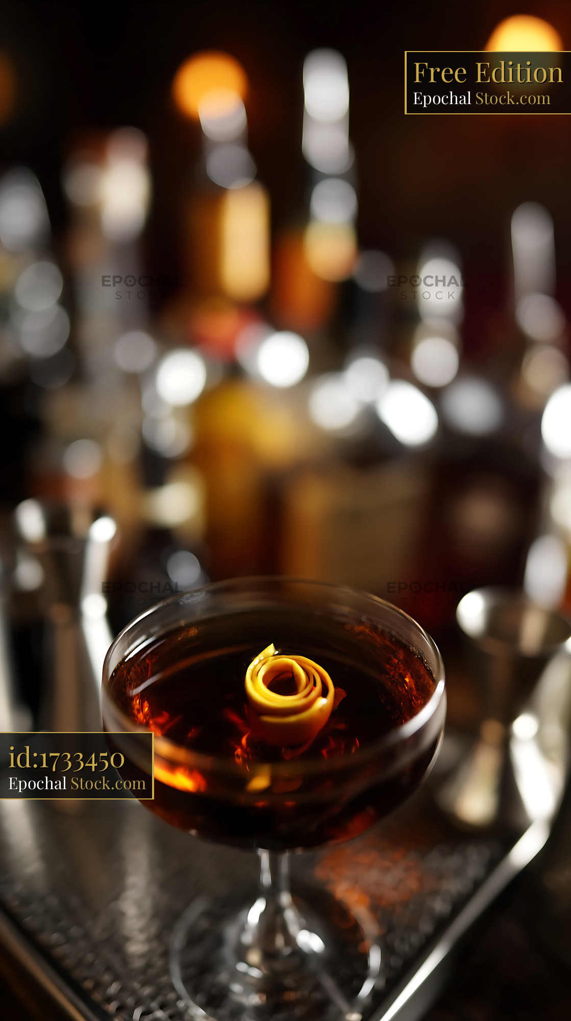 Bushwick Cocktail with Lemon Twist in Bar - stock photo