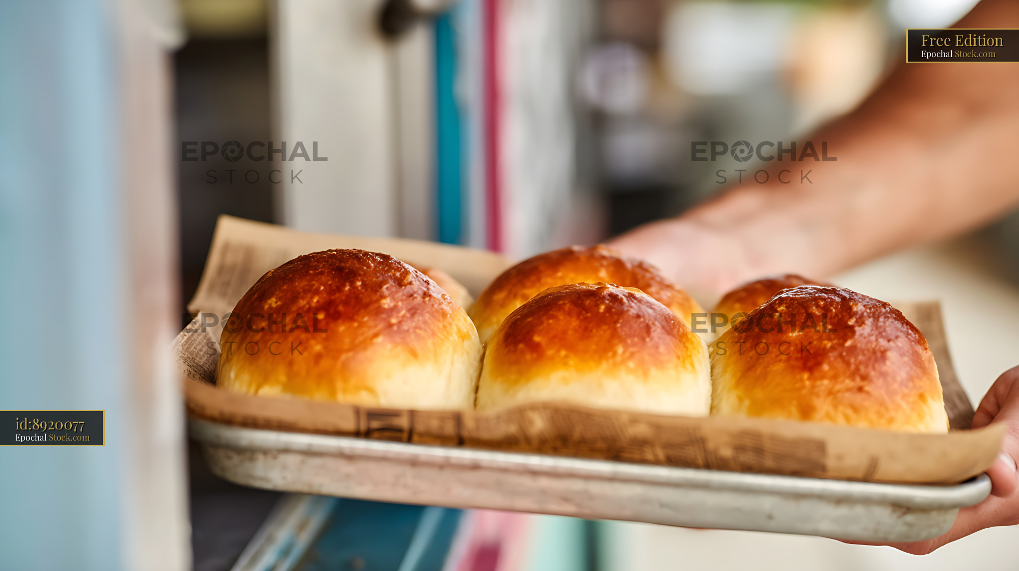 Fresh Golden Artisan Rolls Being Presented - stock photo