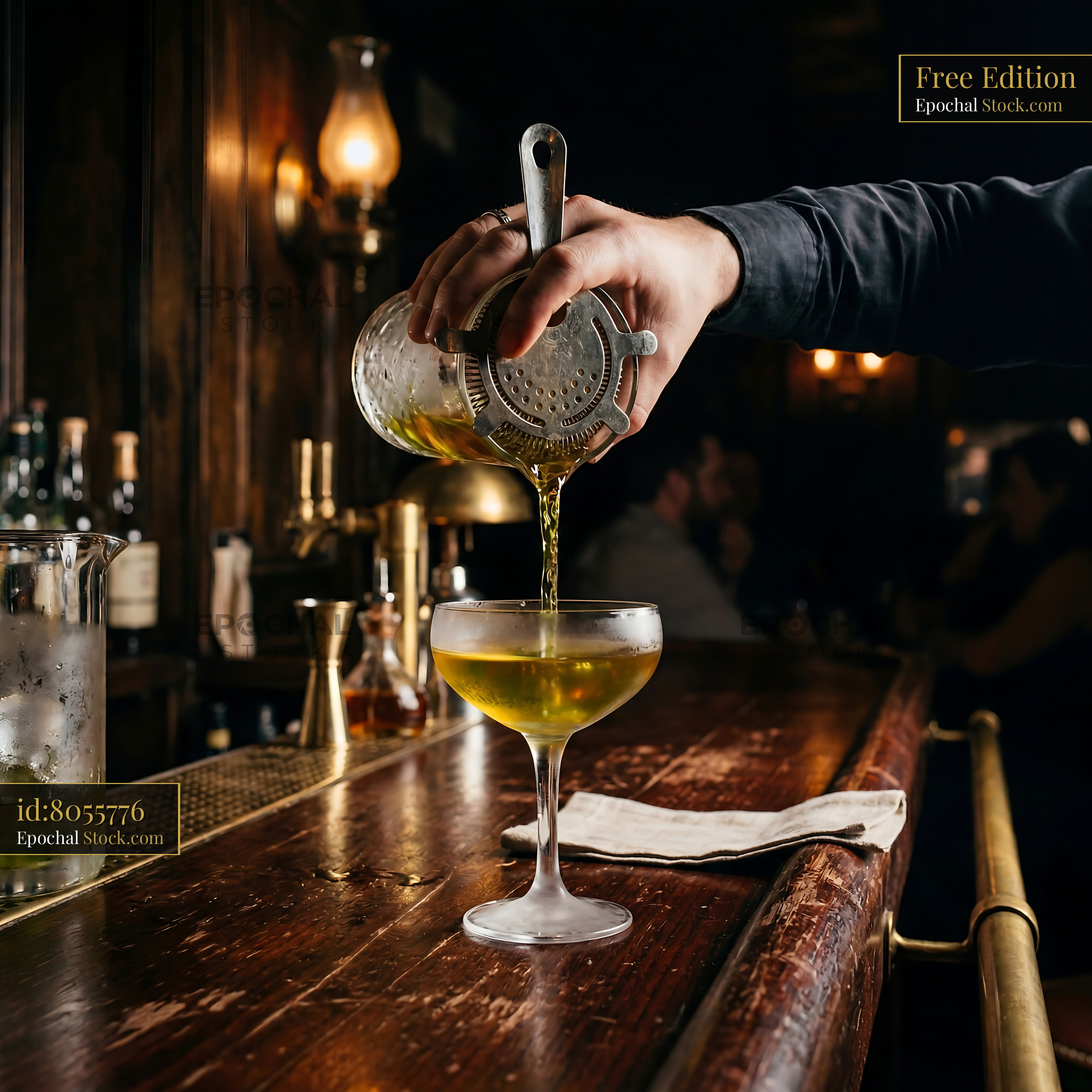Classic Tipperary Cocktail Being Professionally Strained - stock photo