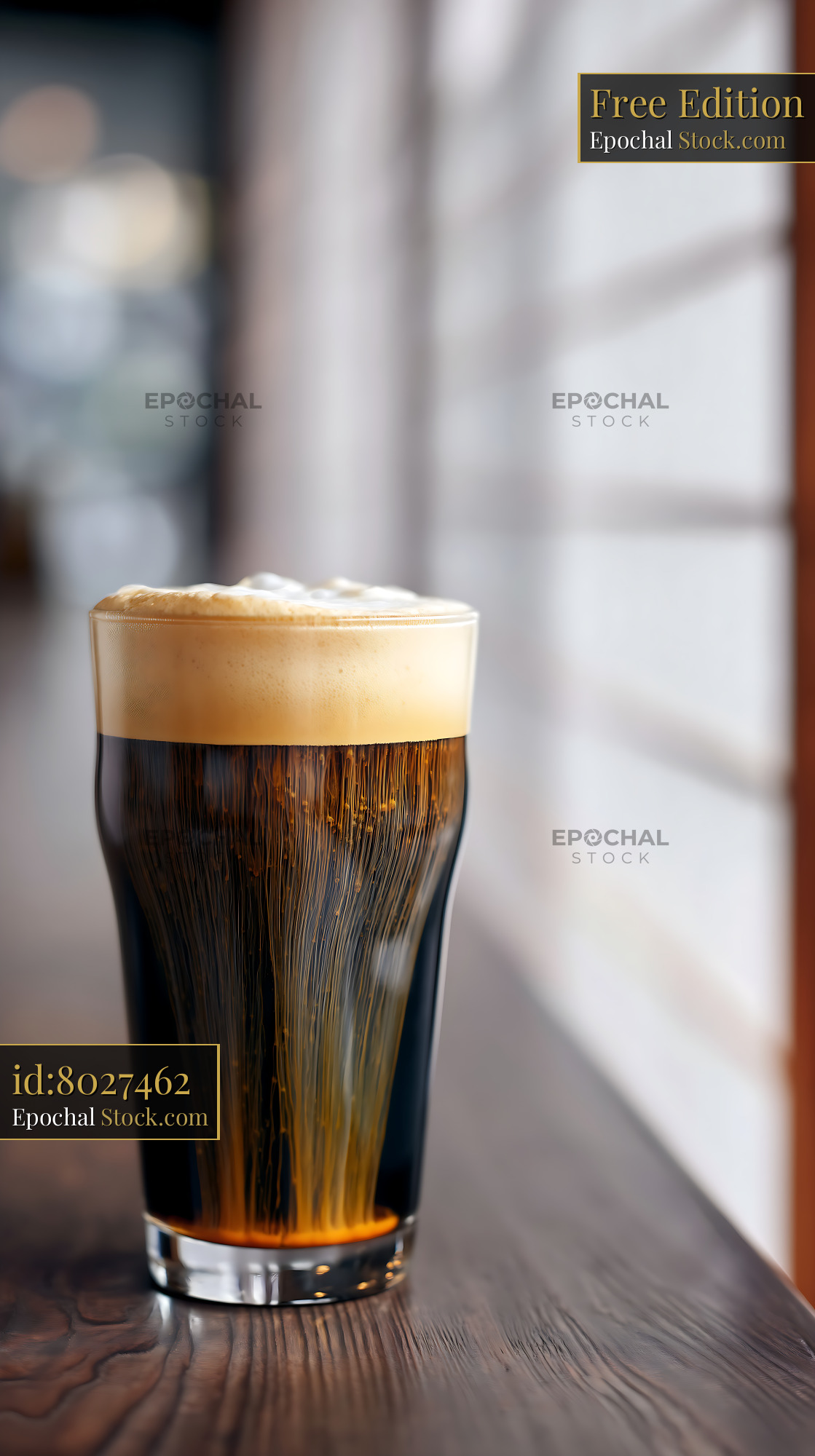 Nitro Caramel Coffee Glass by Window - stock photo