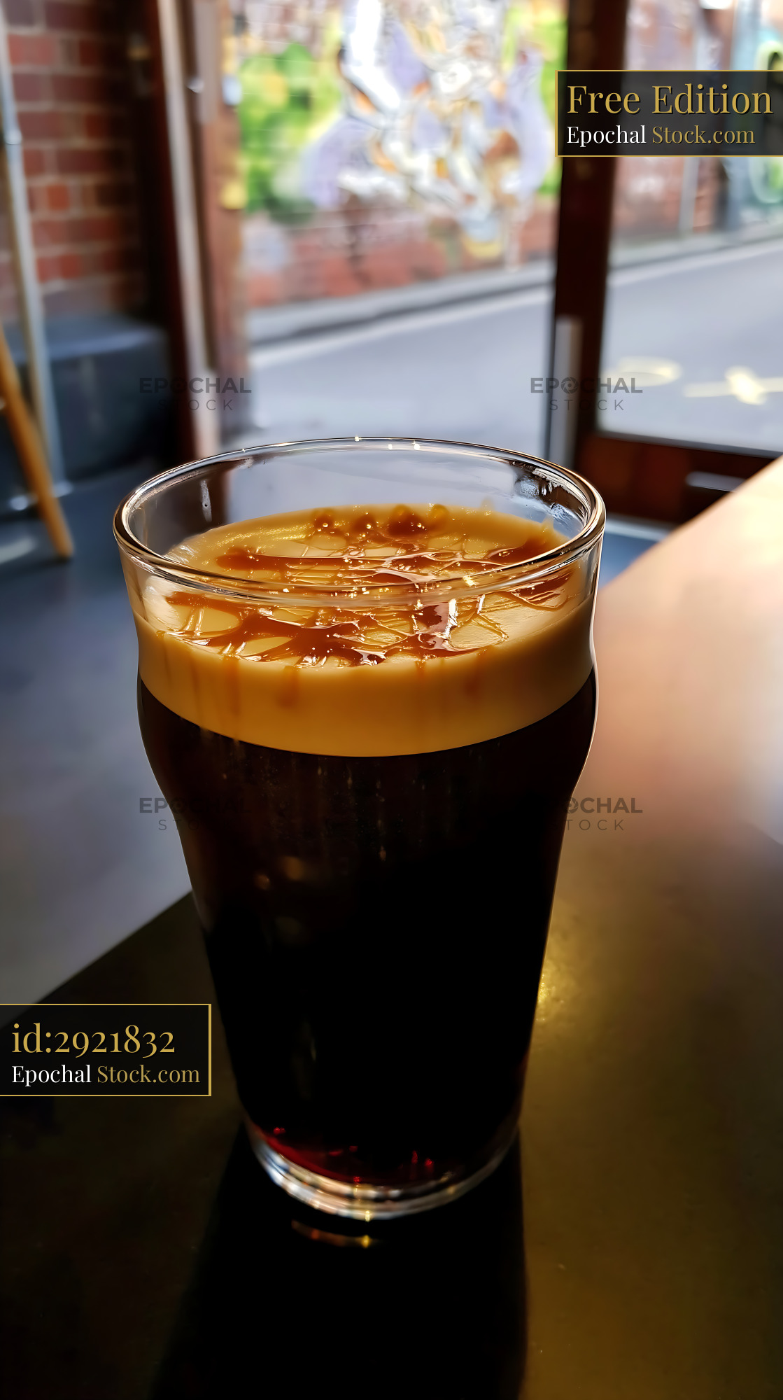 Nitro Caramel Coffee with Creamy Foam Head - stock photo