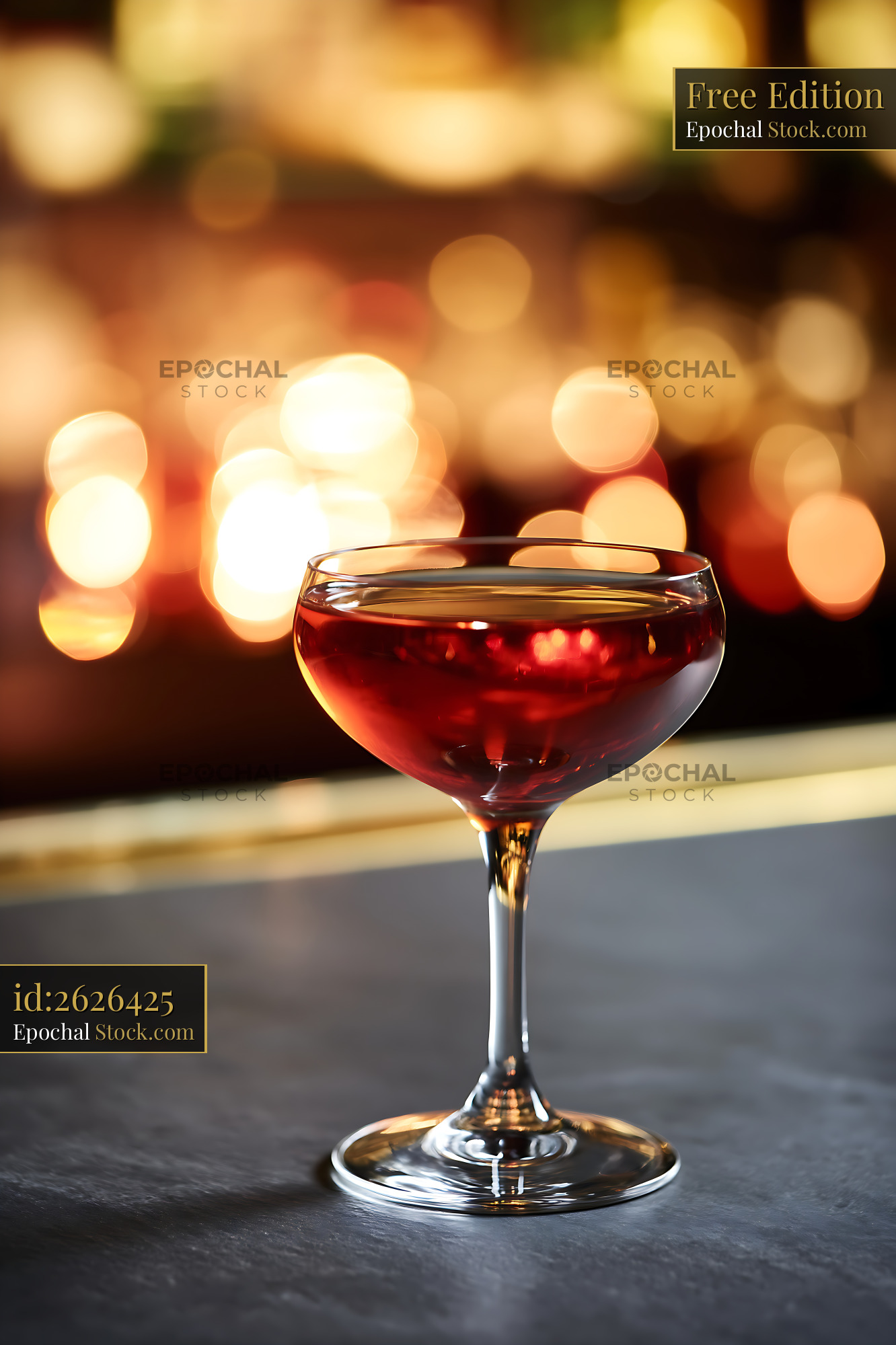 Bushwick Cocktail in Elegant Coupe Glass with Bokeh - stock photo