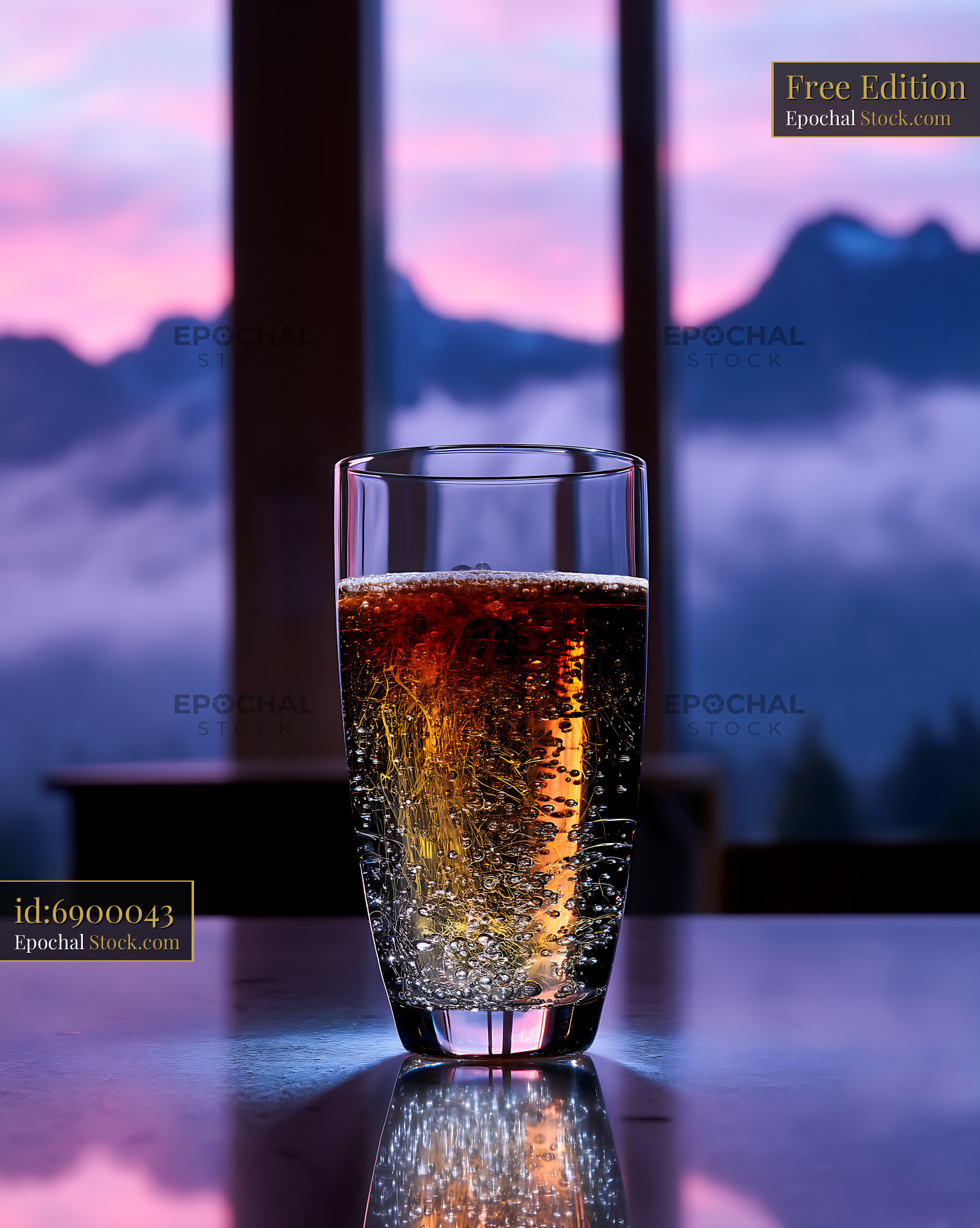 Nitro Caramel Coffee Overlooking Sunset Mountains - stock photo