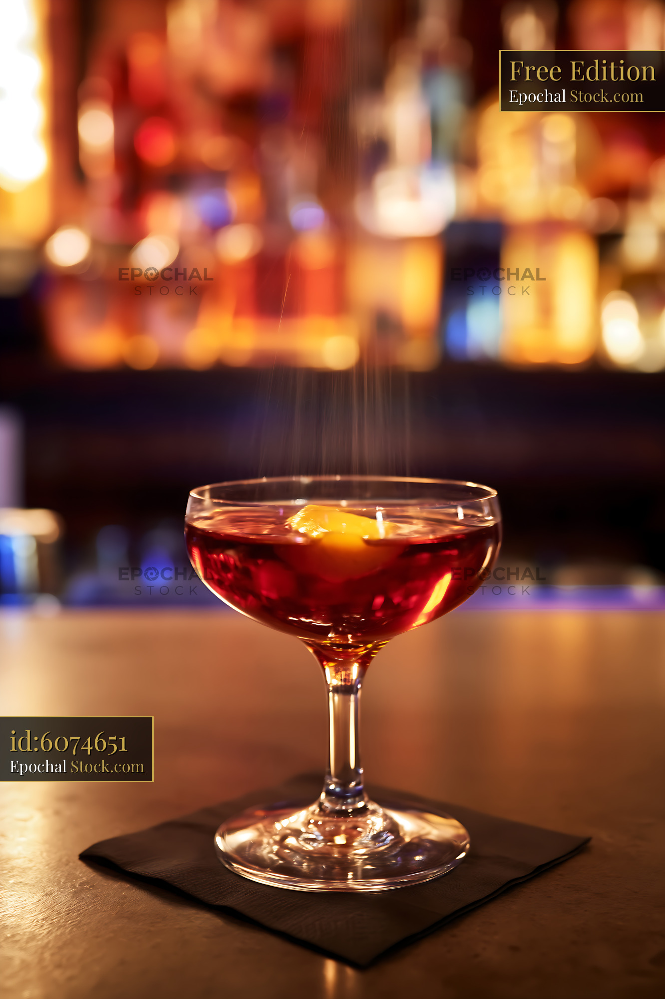 Bushwick Cocktail in Coupe Glass at Bar - stock photo