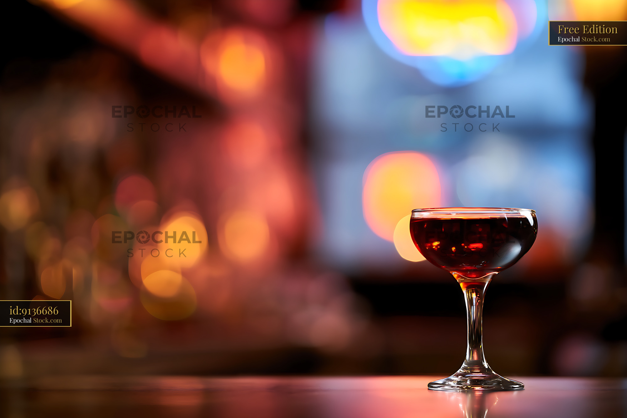 Red Cocktail with Blurred Bokeh Bar Lights - stock photo