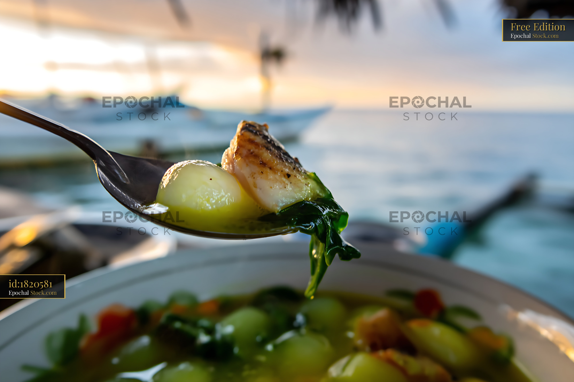 Steaming Lor Mee Soup with Fish and Greens at Sunset - stock photo