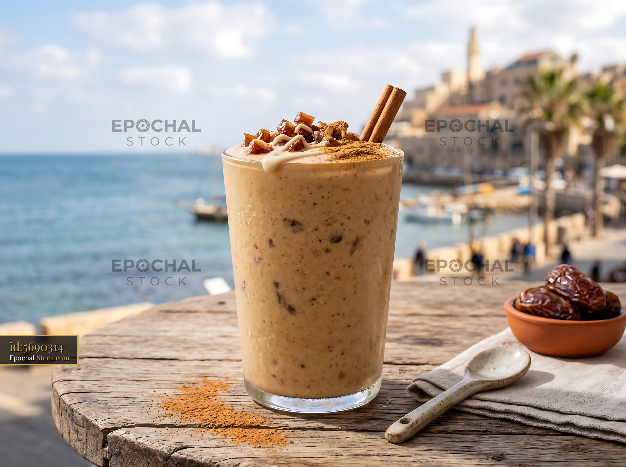 Tahini Date Shake on Seaside Wooden Dock - stock photo