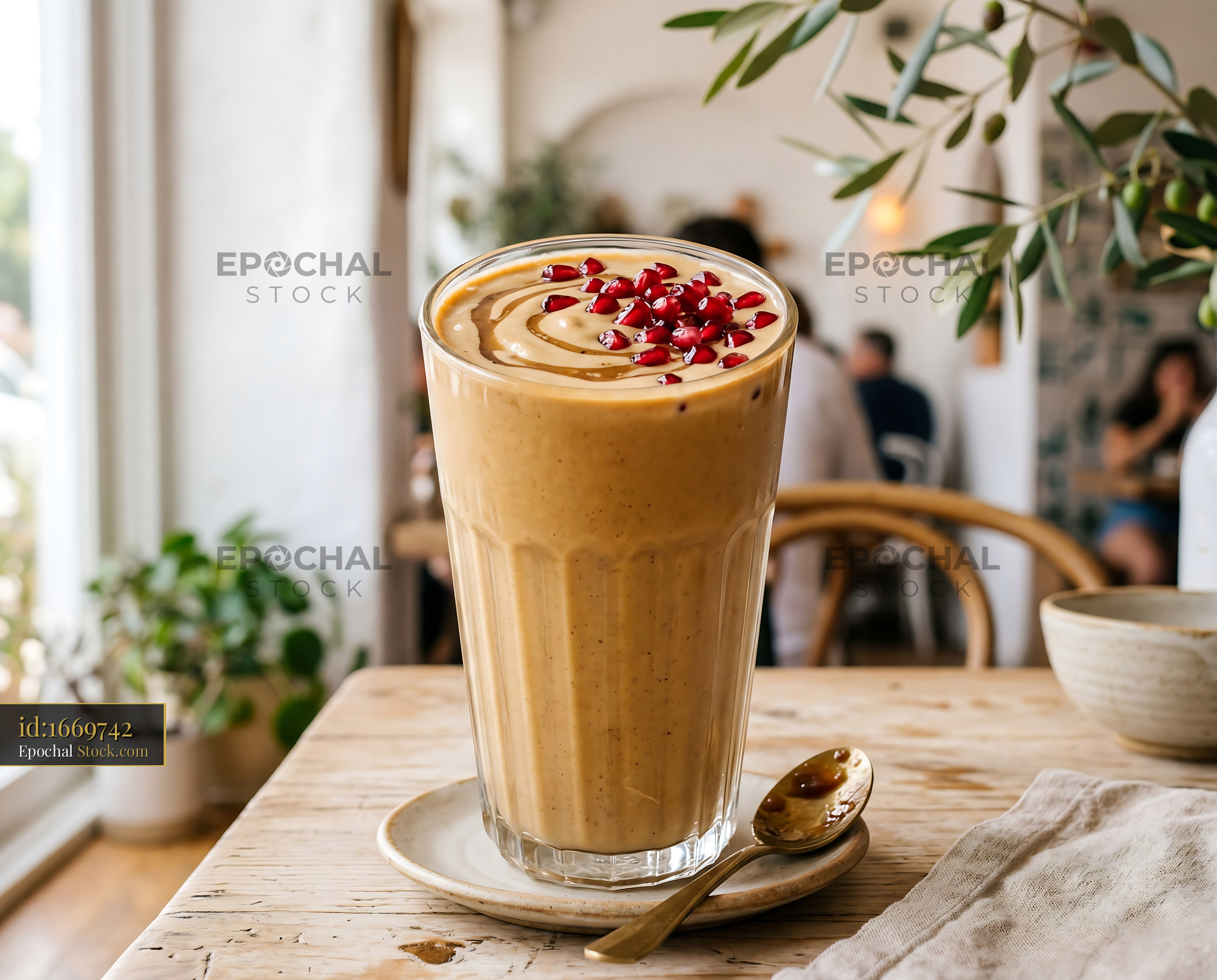 Tahini Date Shake with Pomegranate in Caf? - stock photo