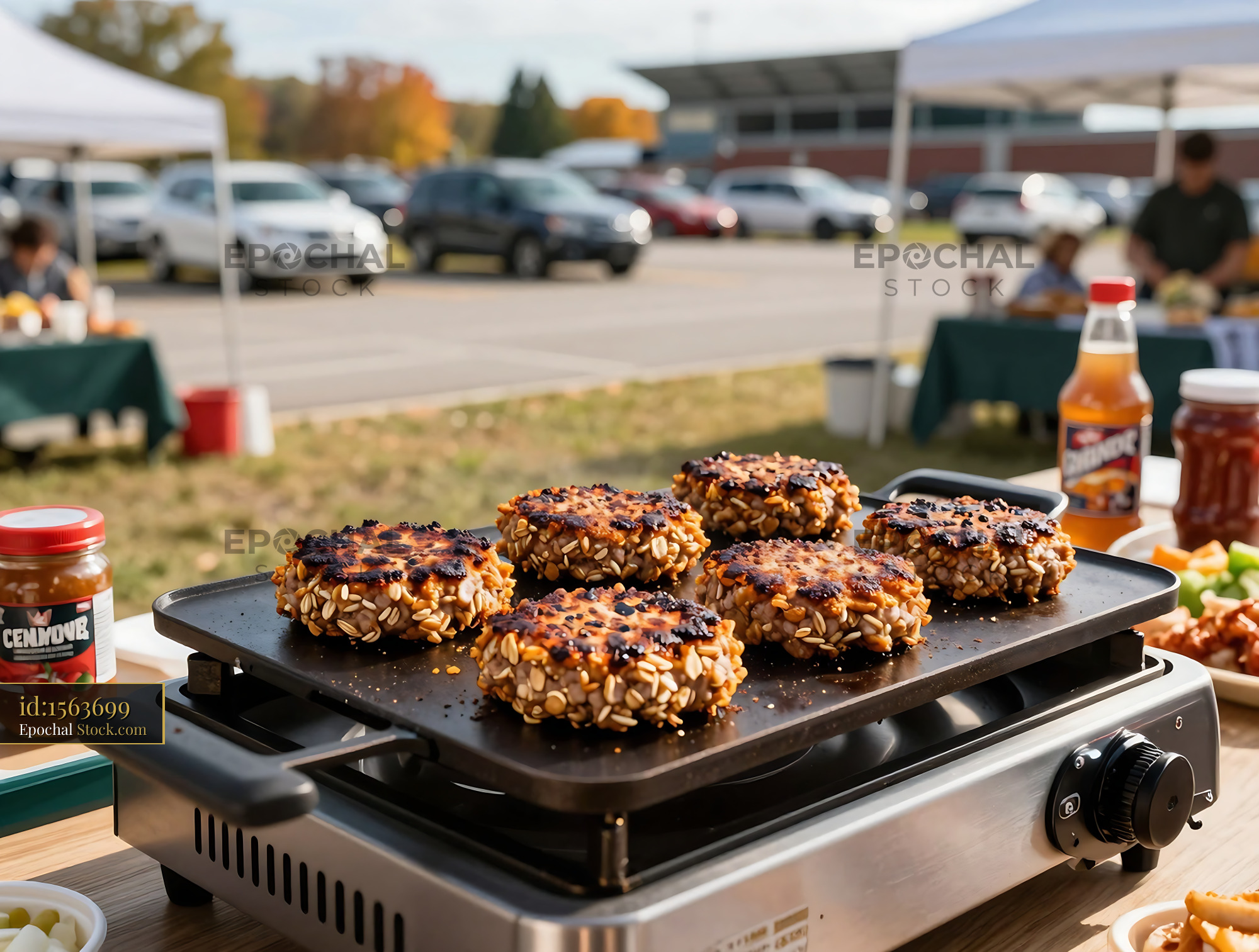 Goetta Sizzling on Griddle at Tailgate Party - stock photo
