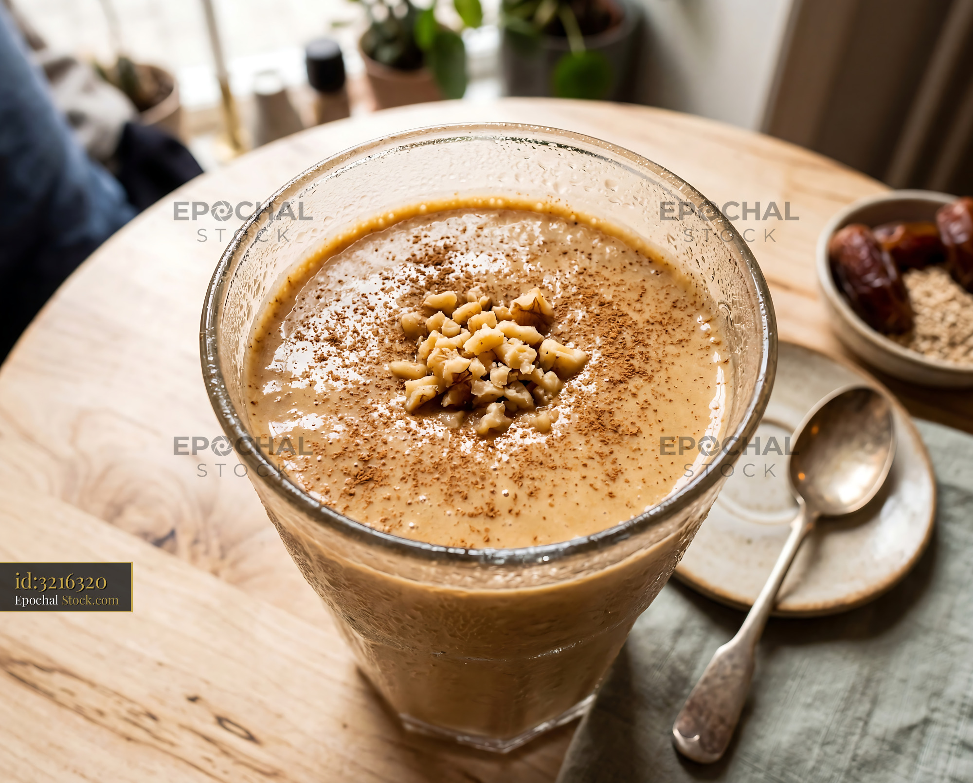 Tahini Date Shake Topped with Cinnamon - stock photo