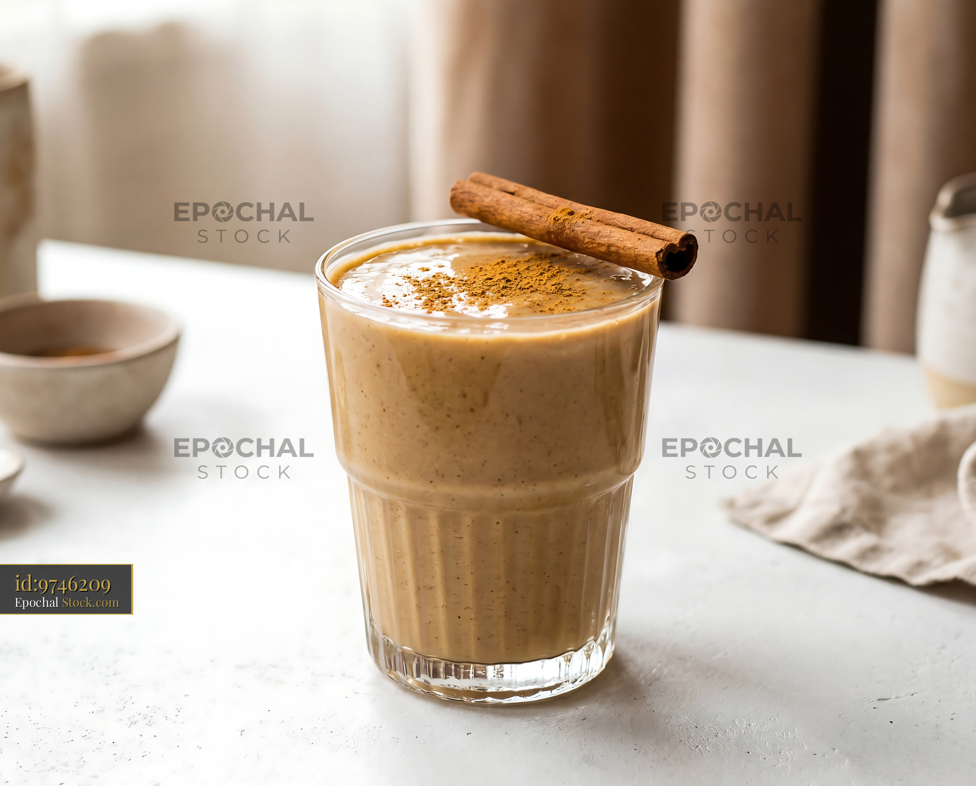 Creamy Tahini Date Shake with Cinnamon Stick - stock photo