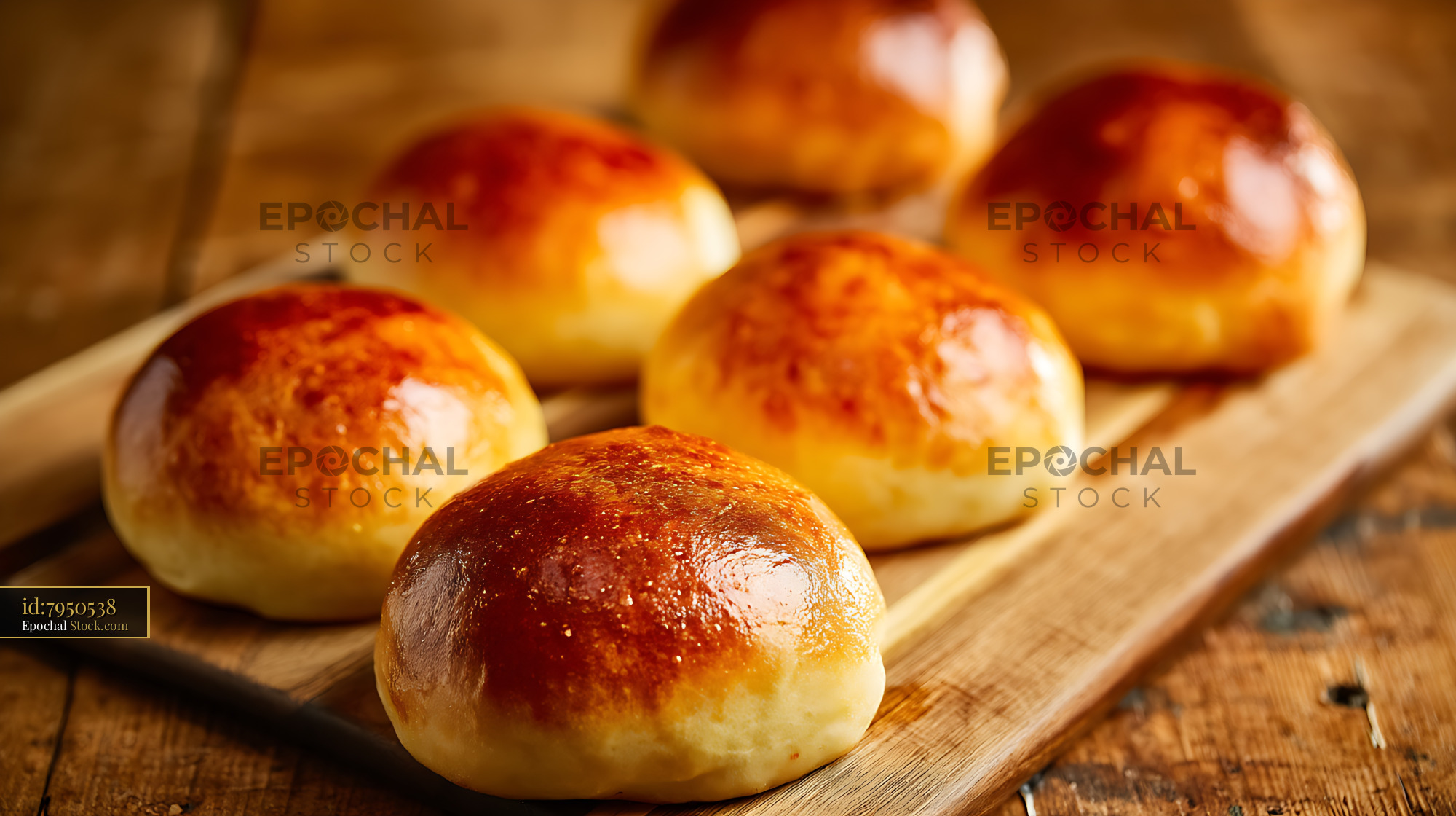 Golden Bierocks Fresh Baked Pastries on Wooden Serving Board - stock photo