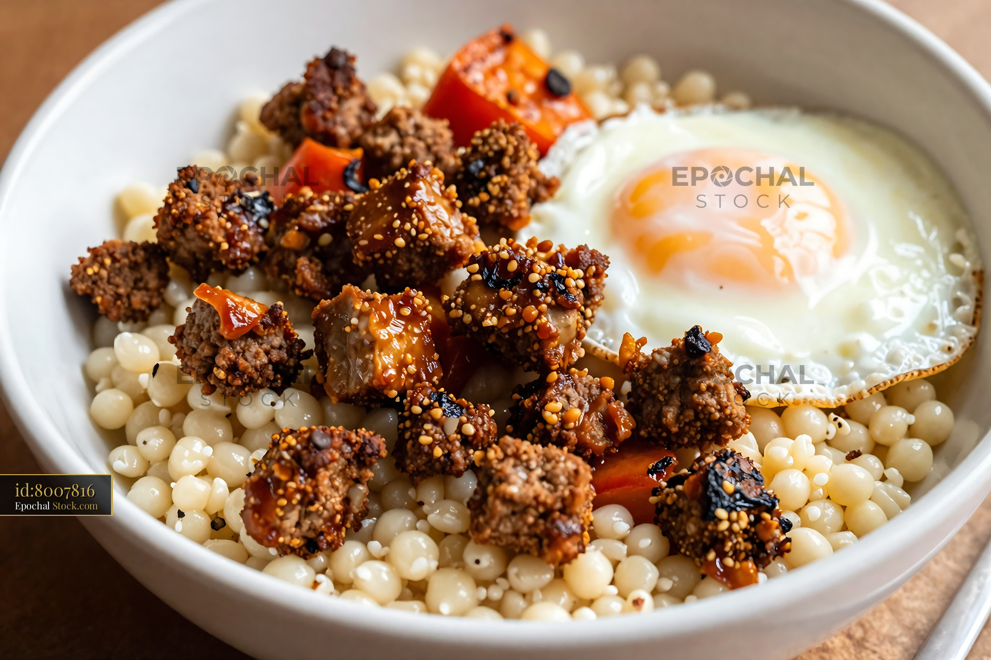 Goetta with Couscous and Fried Egg Bowl - stock photo