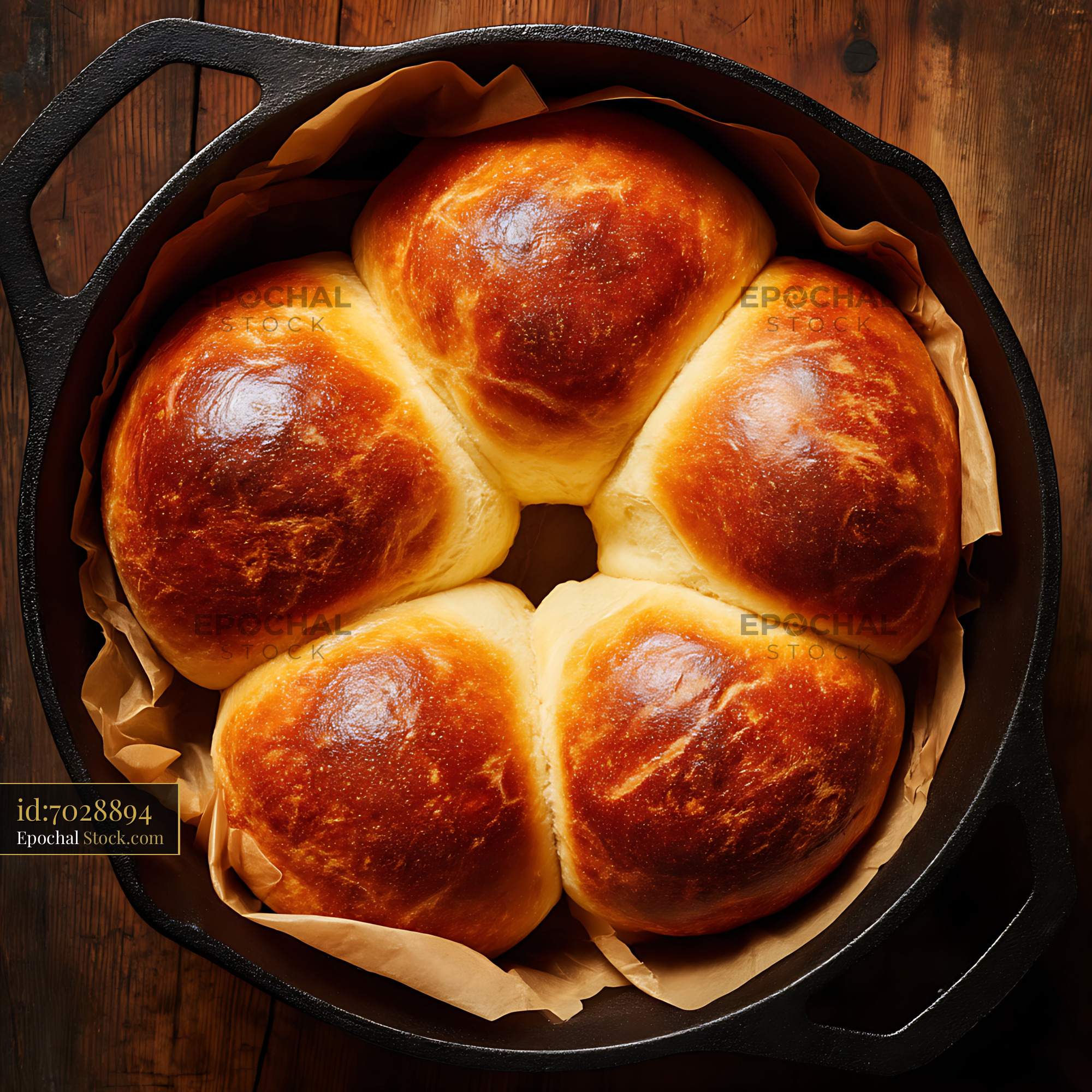 Bierocks Fresh from Cast Iron Skillet on Rustic Wooden Table - stock photo