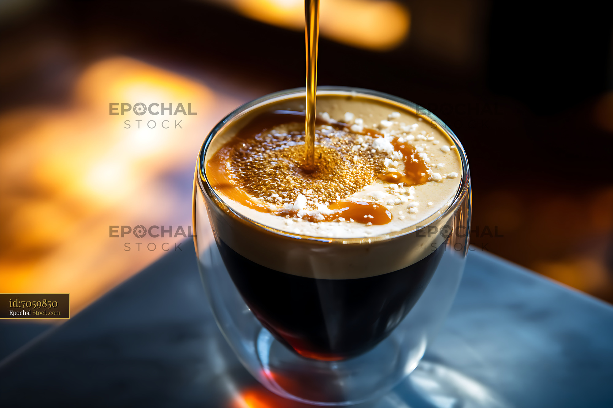 Nitro Caramel Coffee Pouring Into Glass Cup - stock photo