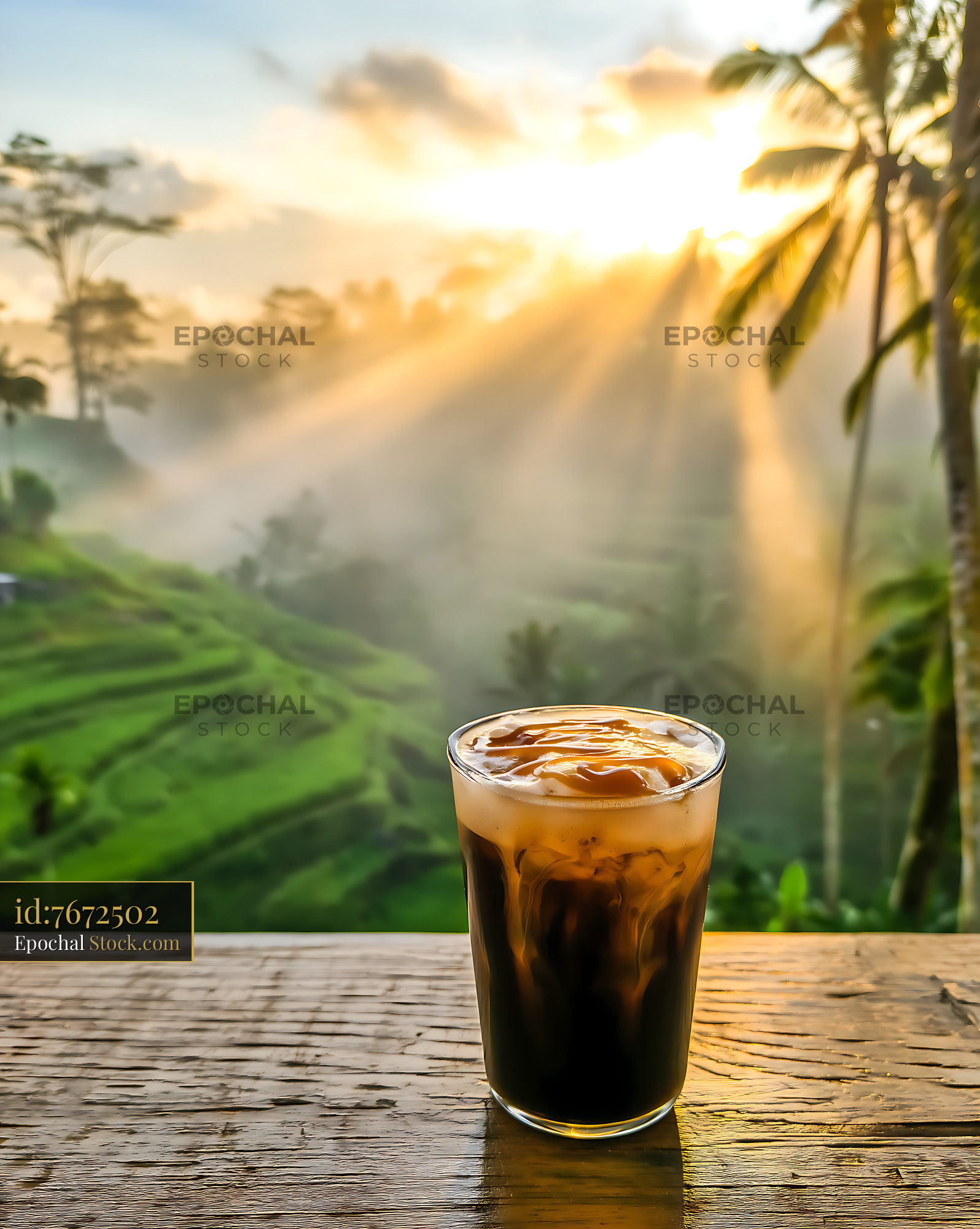 Iced Coffee Against Sunrise Mountain Valley - stock photo