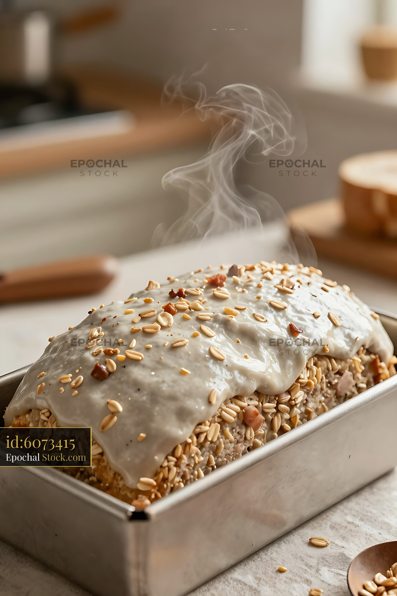 Freshly Baked Peanut Loaf Cake with Steam Rising - stock photo