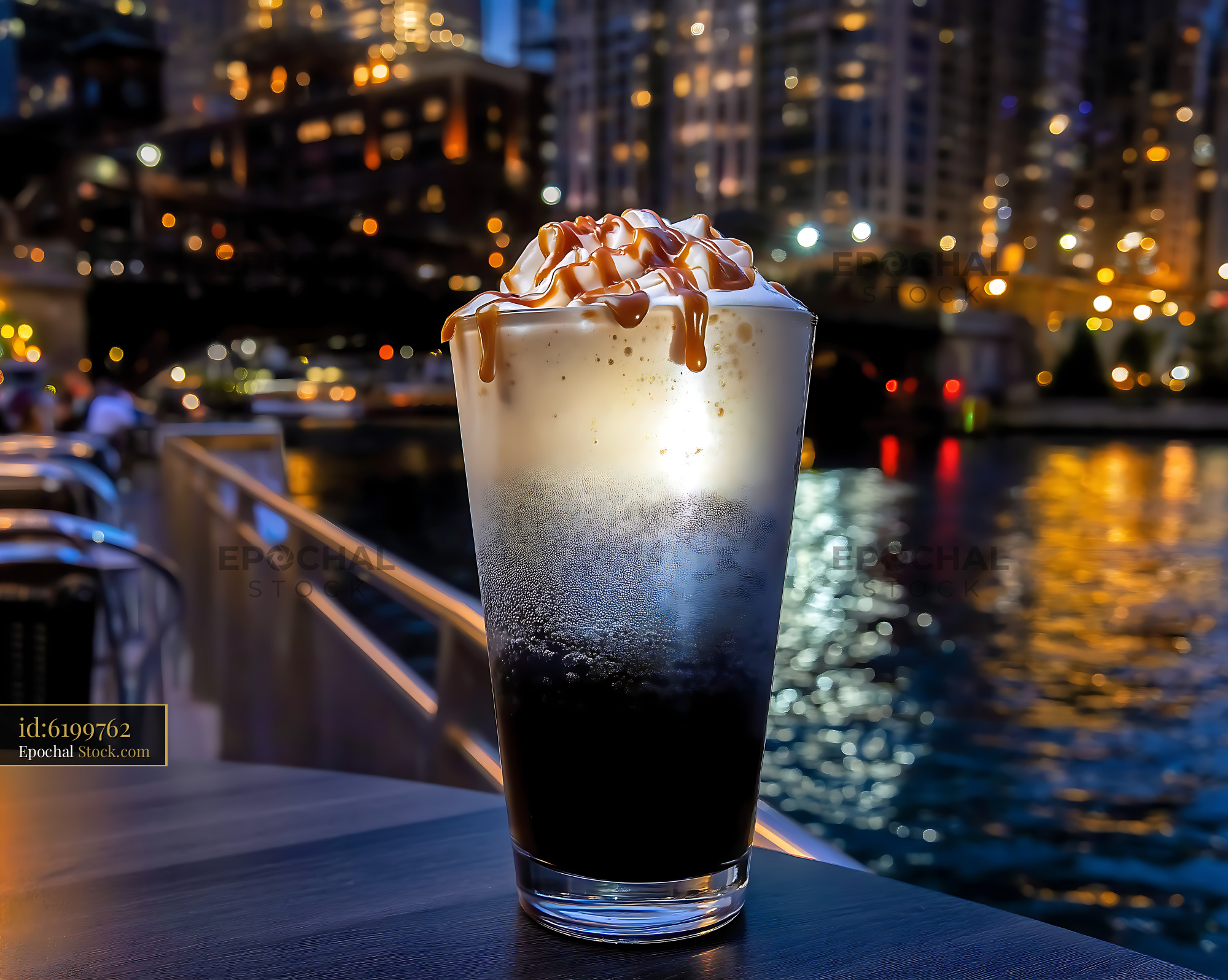 Nitro Caramel Coffee at Rooftop Bar with City View - stock photo