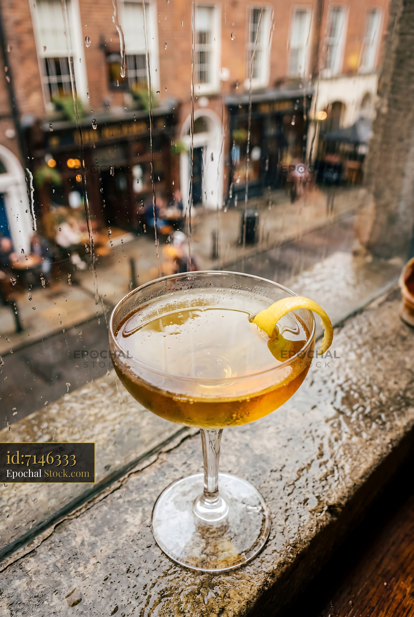 Tipperary Cocktail on Historic Rainy Street - stock photo