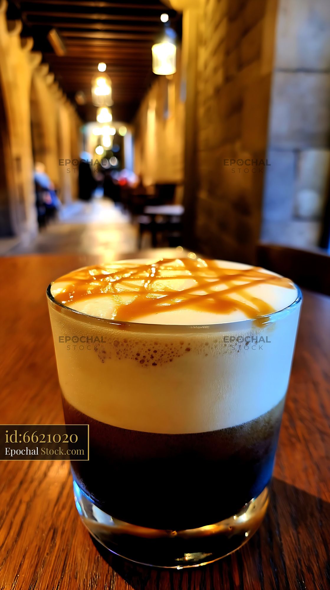 Nitro Caramel Coffee in Atmospheric Cafe - stock photo