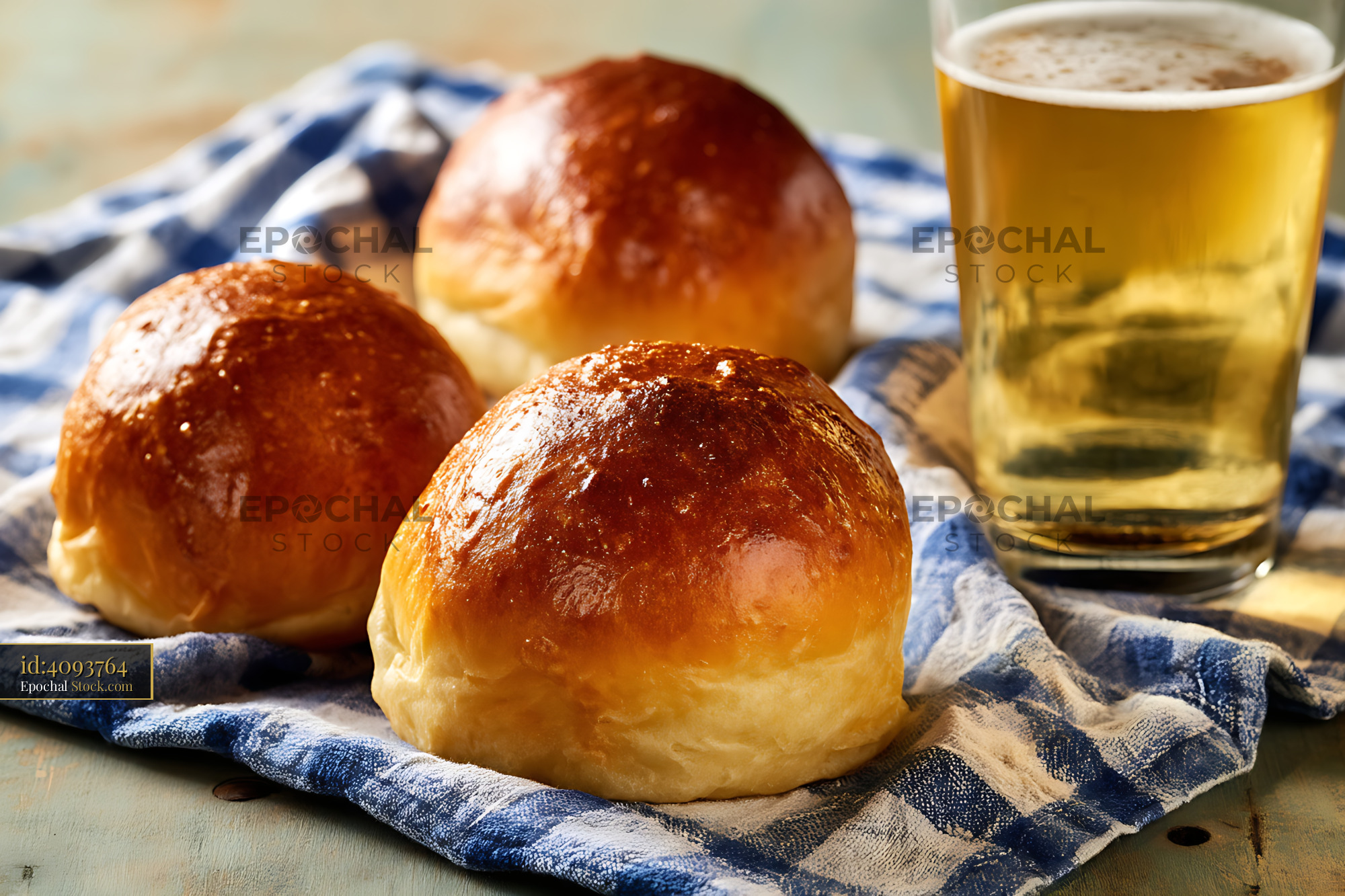 Golden Glazed Bread Rolls and Beer - stock photo