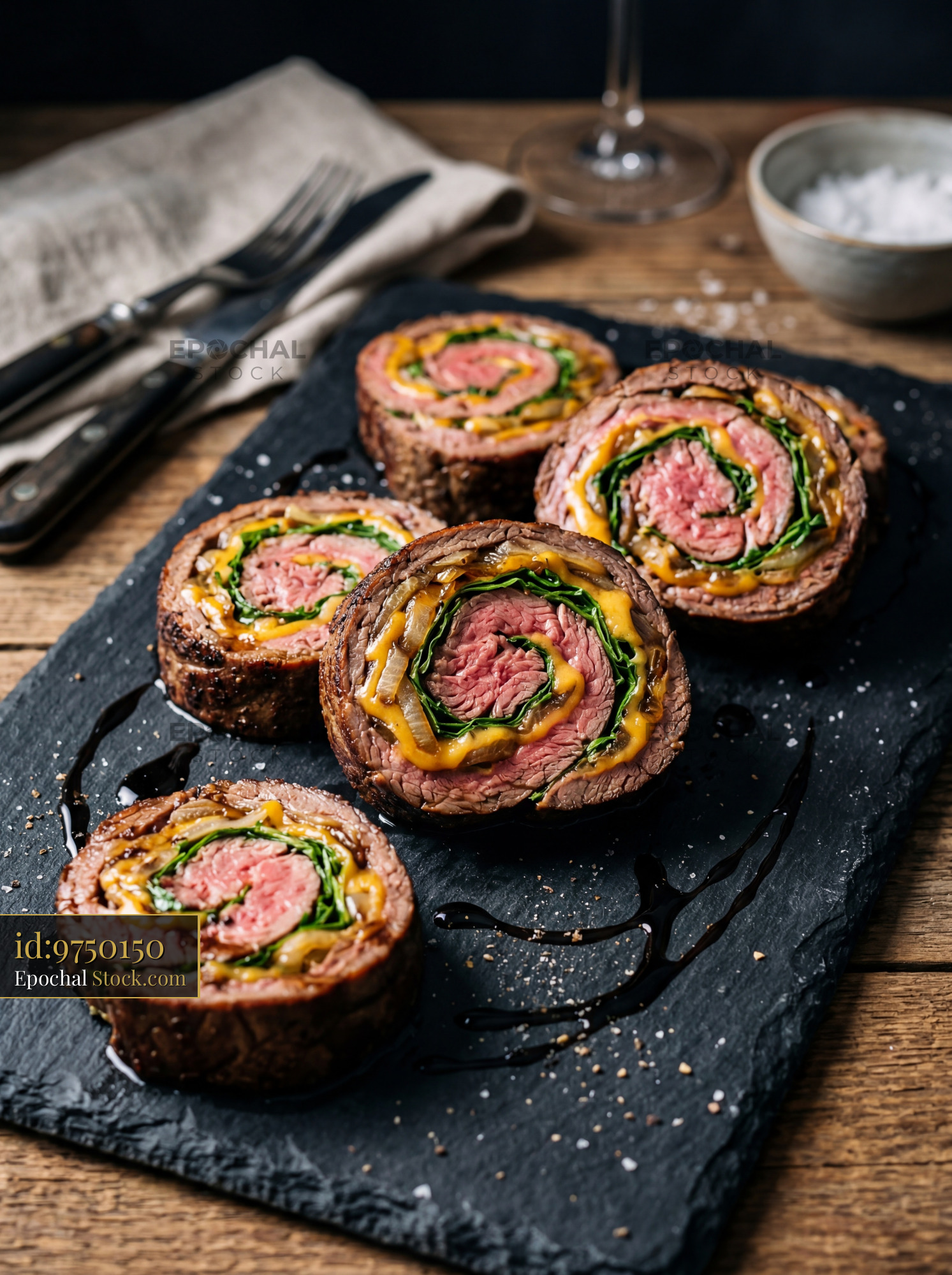 Rare Beef Roulade Slices with Spinach Filling - stock photo