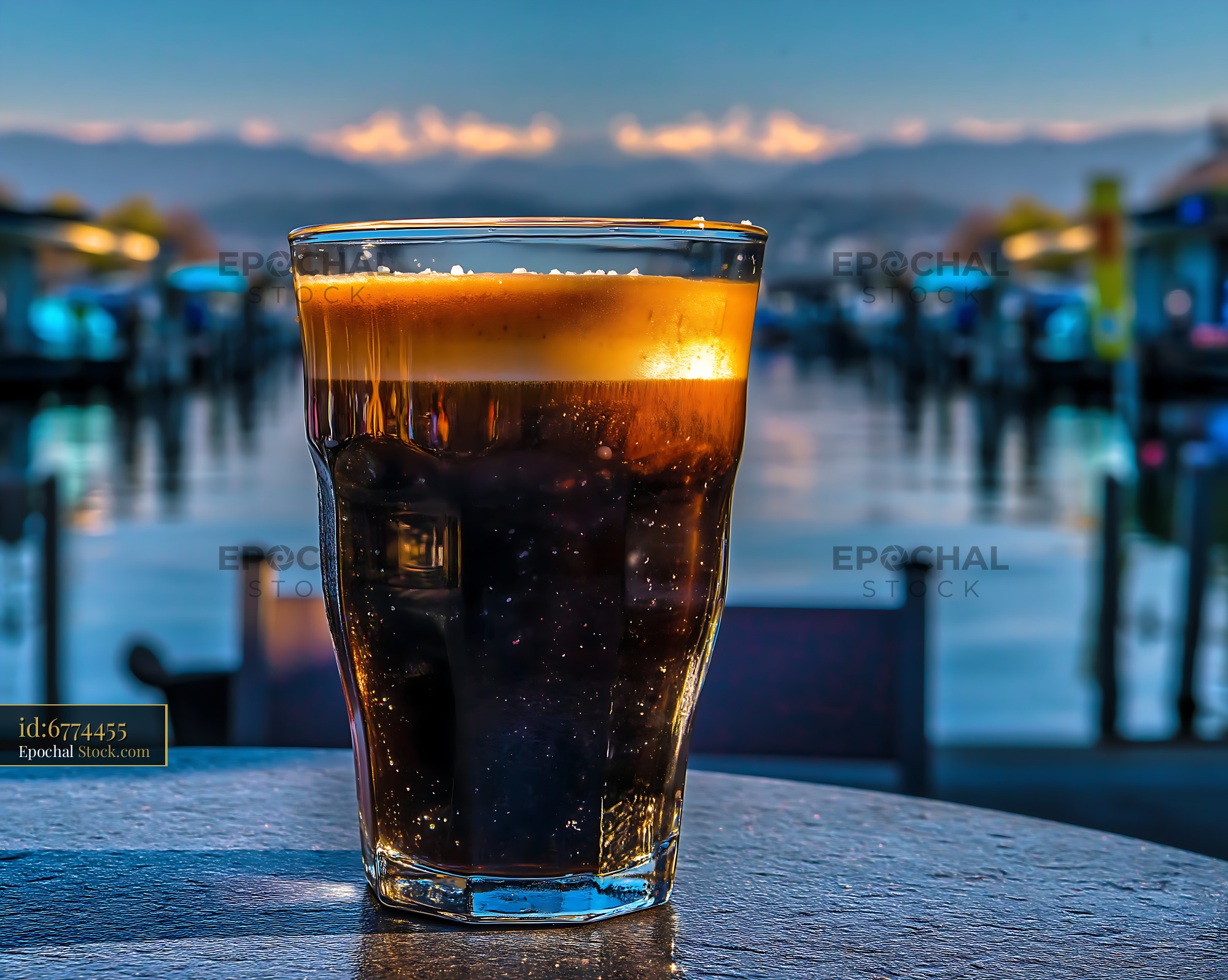 Nitro Caramel Coffee by Waterfront at Dusk - stock photo