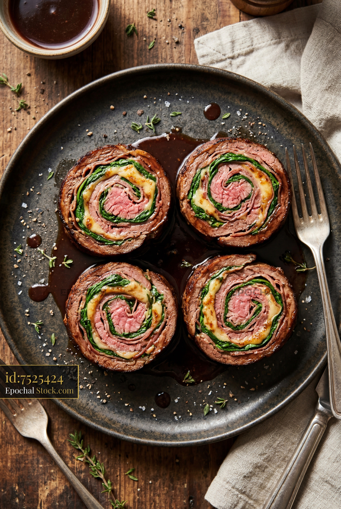 Beef Roulade Pinwheels with Spinach & Sauce - stock photo
