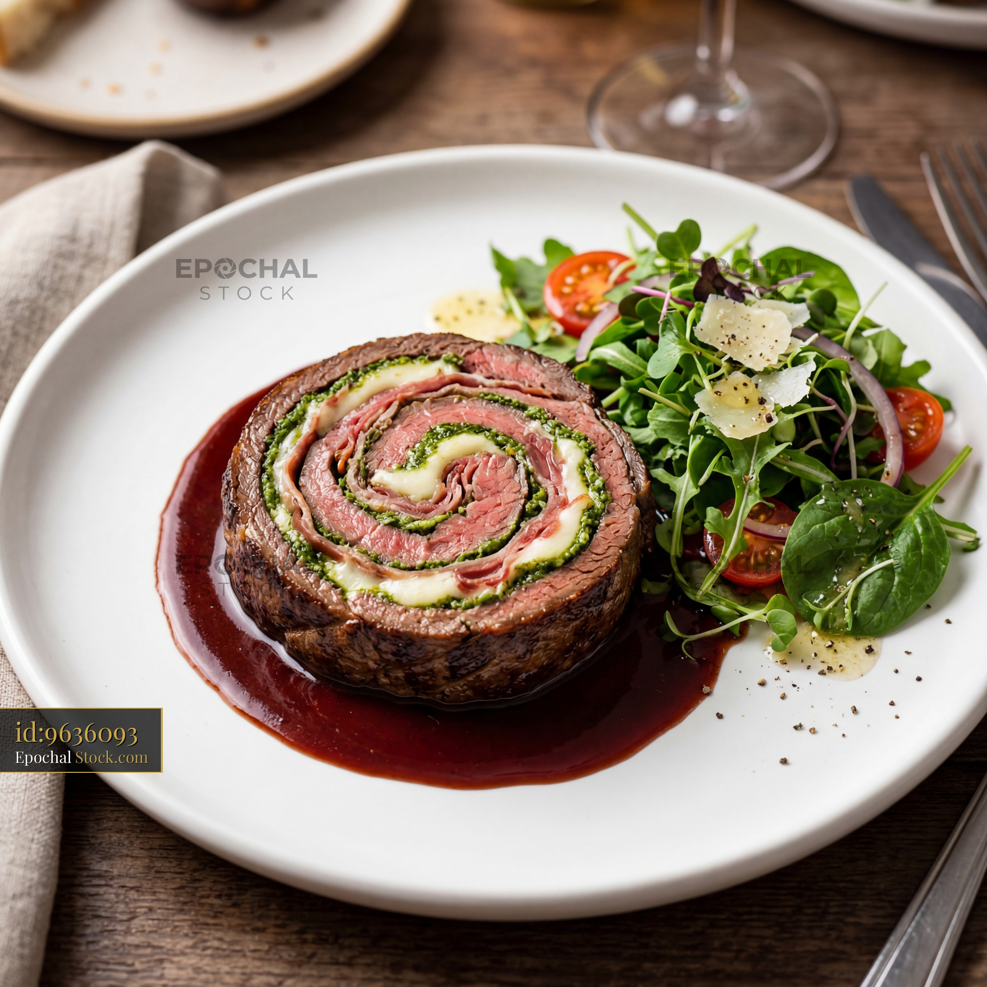 Beef Roulade Sliced with Red Wine Sauce & Salad - stock photo