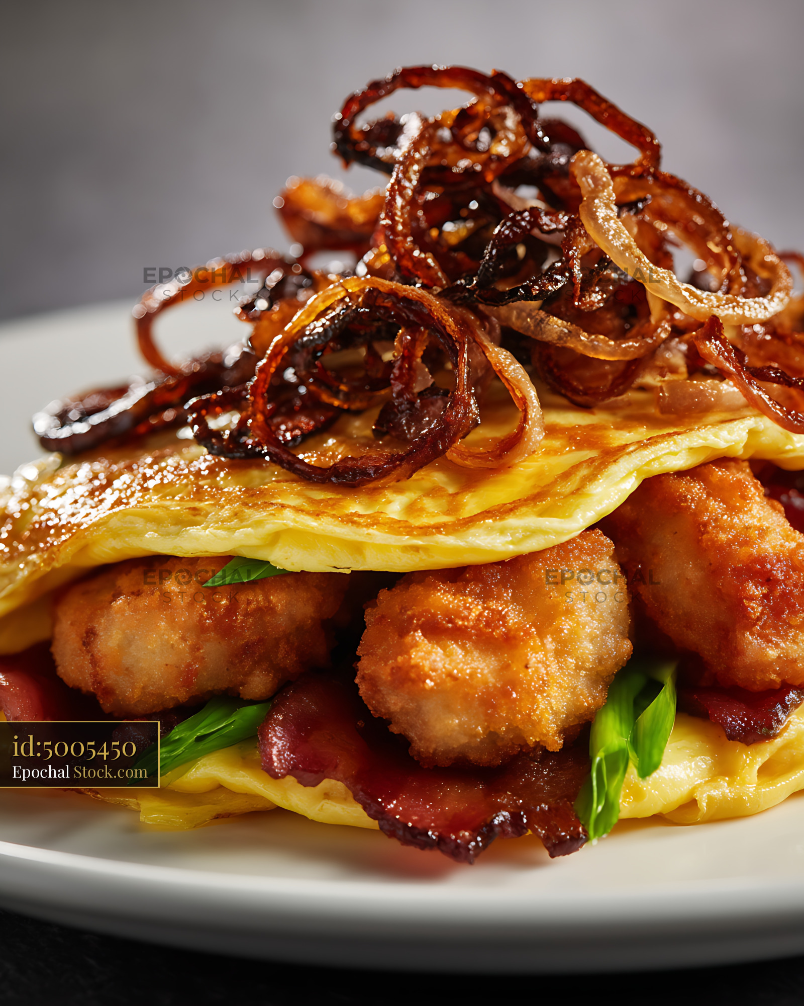 Gourmet Shrimp Omelet with Crispy Onion Strings - stock photo