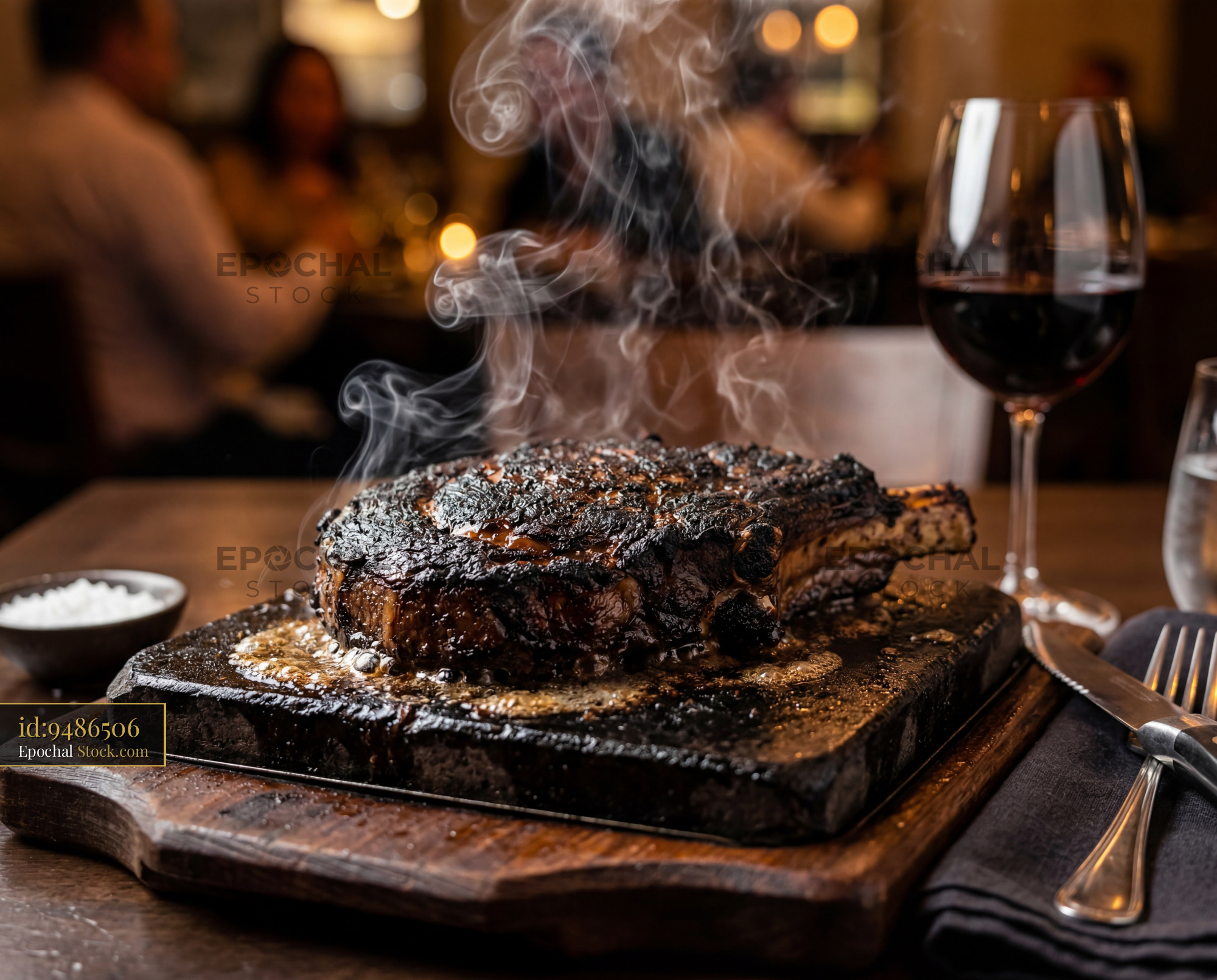 Steaming Tomahawk Steak with Red Wine - stock photo
