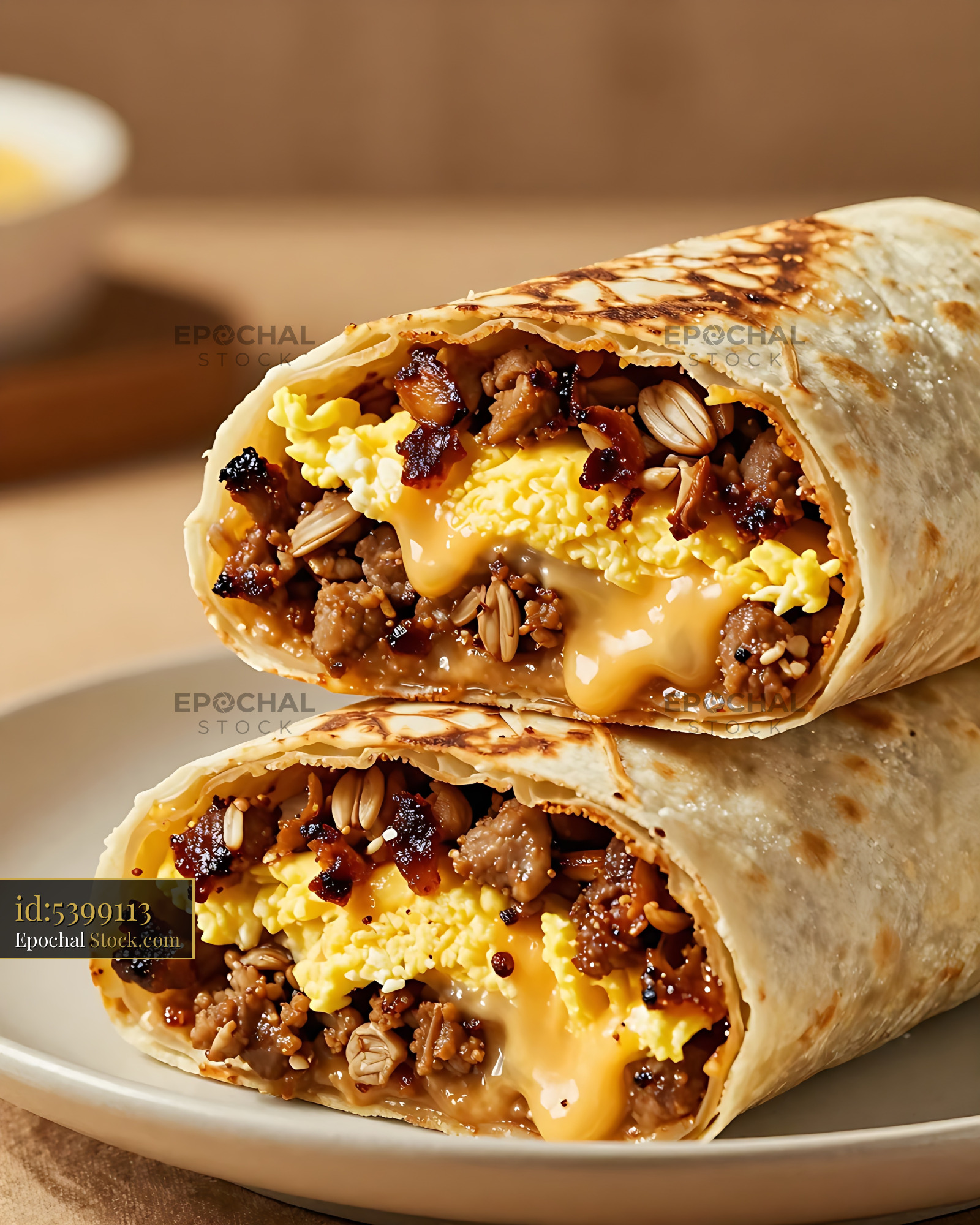Cheesy Breakfast Burritos with Scrambled Eggs - stock photo