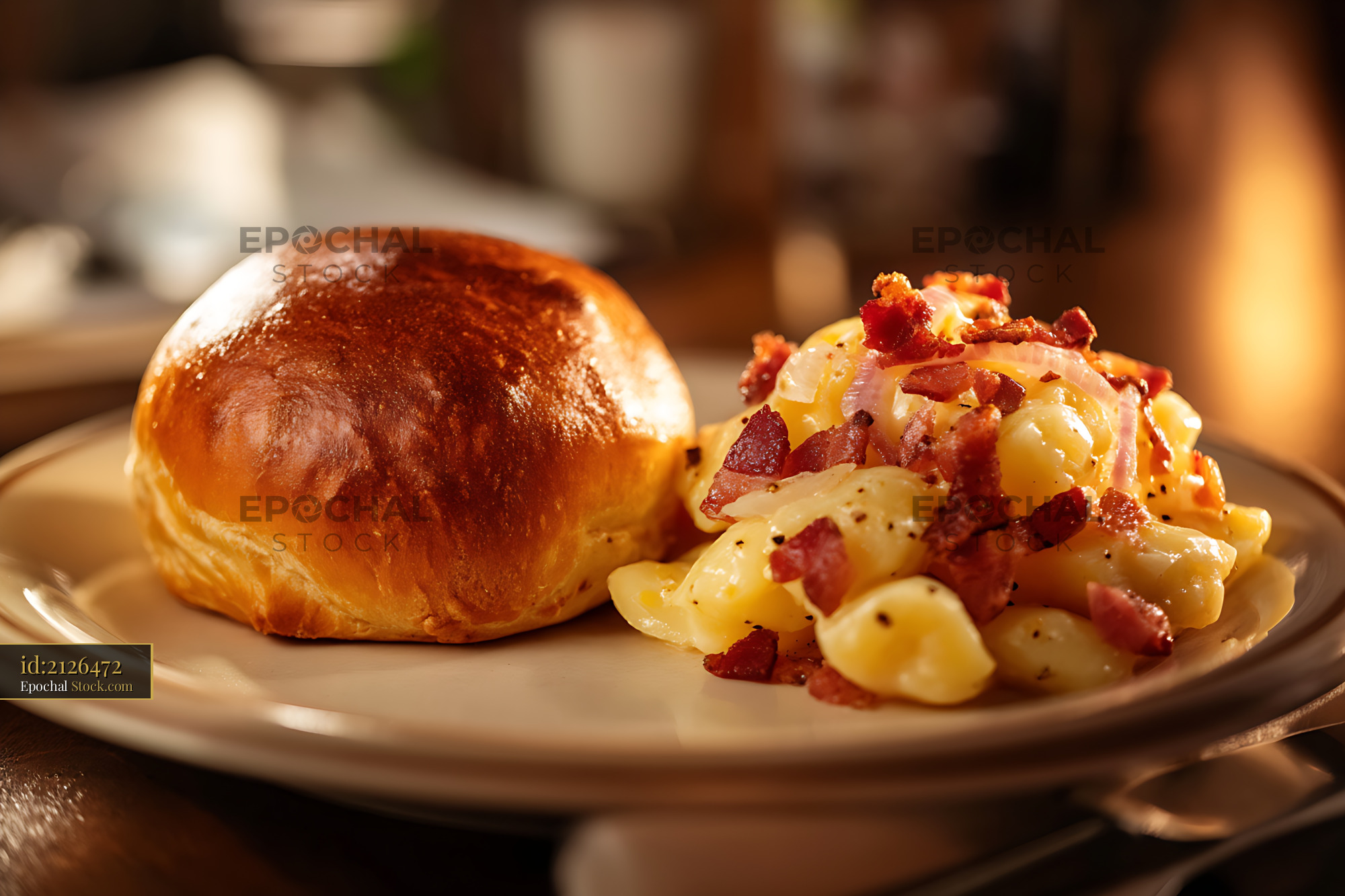 Golden Roll With Crispy Bacon Hash Browns Plate - stock photo