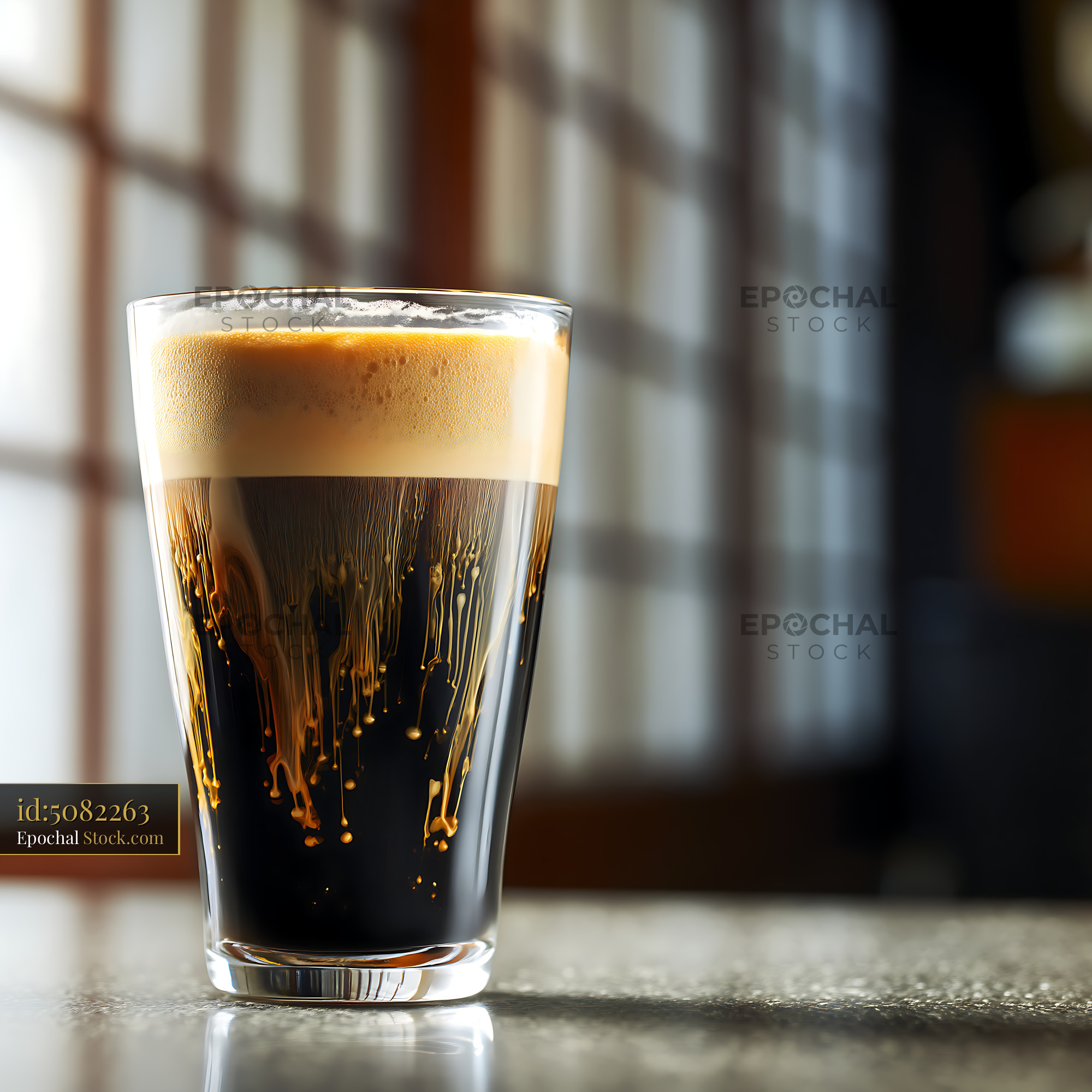 Nitro Caramel Coffee Glass, Creamy Foam - stock photo