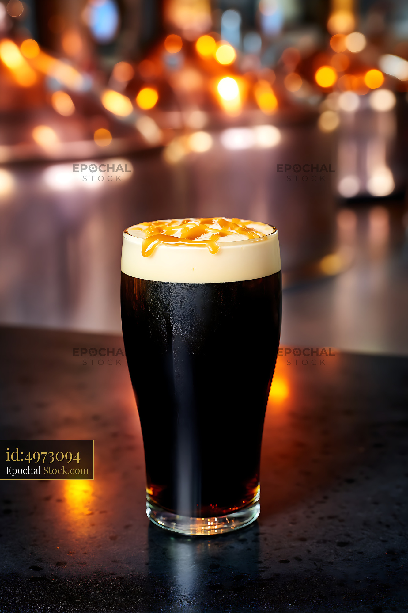 Nitro Caramel Coffee on Dark Counter - stock photo