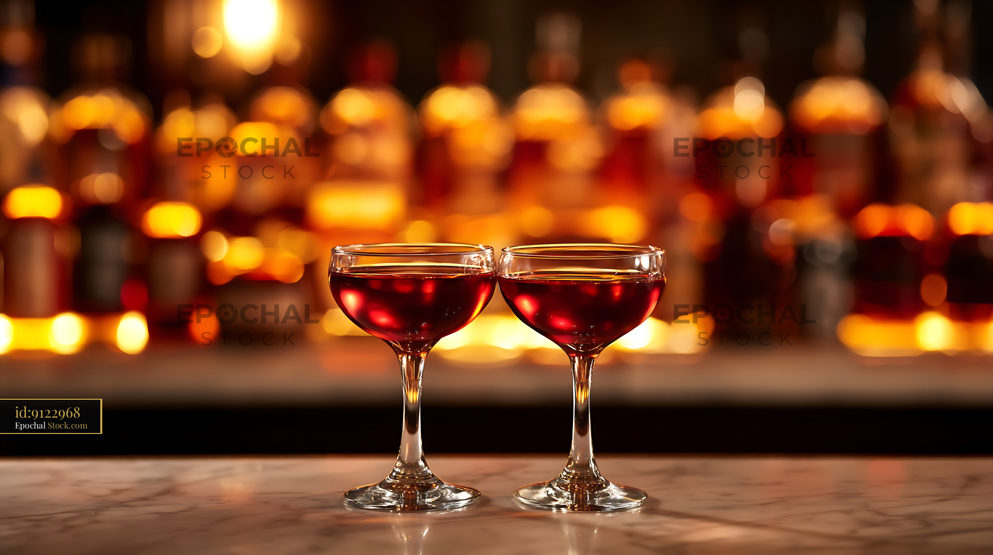 Bushwick Cocktail Pair on Bar Counter with Warm Glow - stock photo