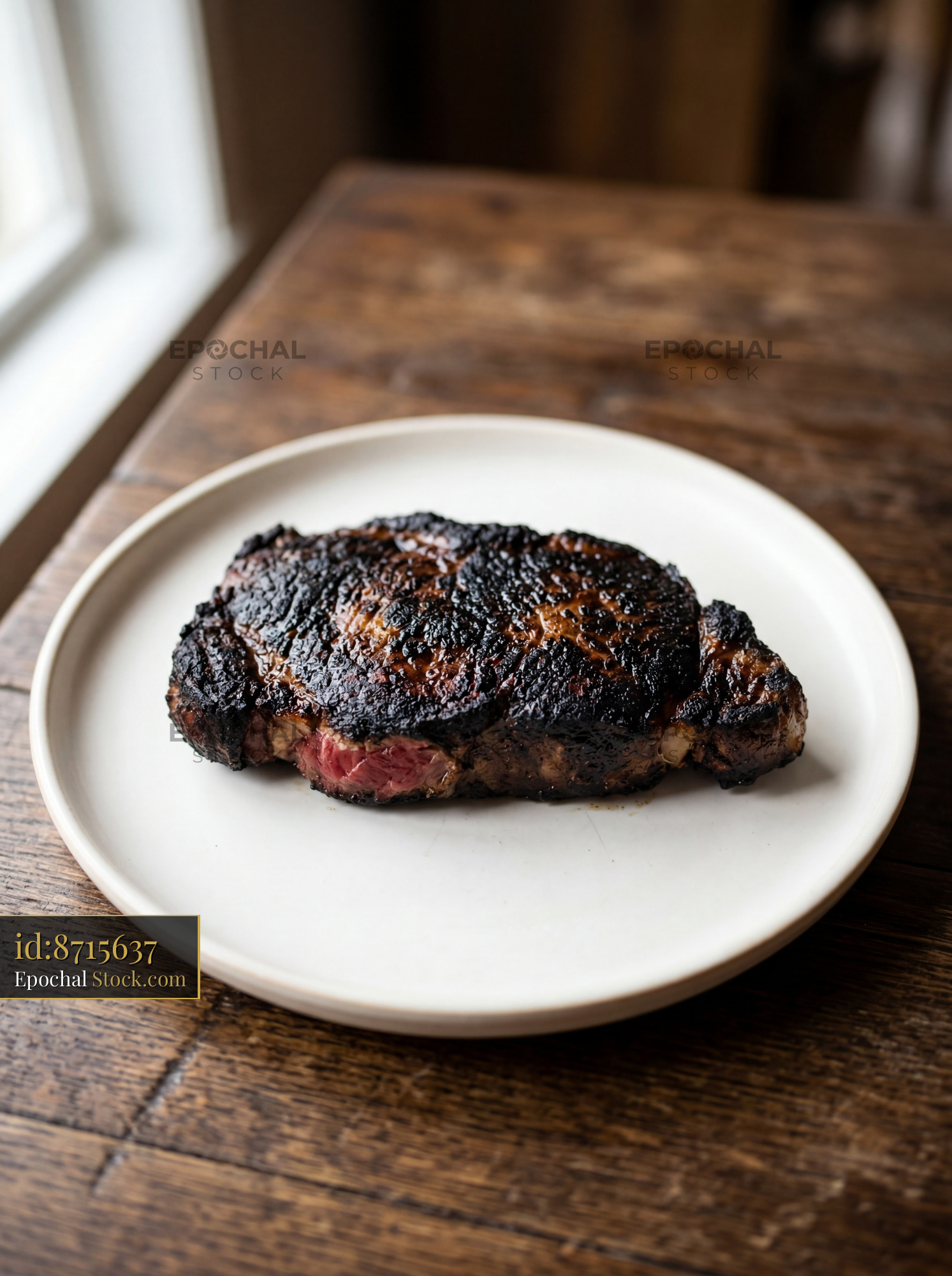 Seared Prime Steak Medium Rare on White Plate - stock photo