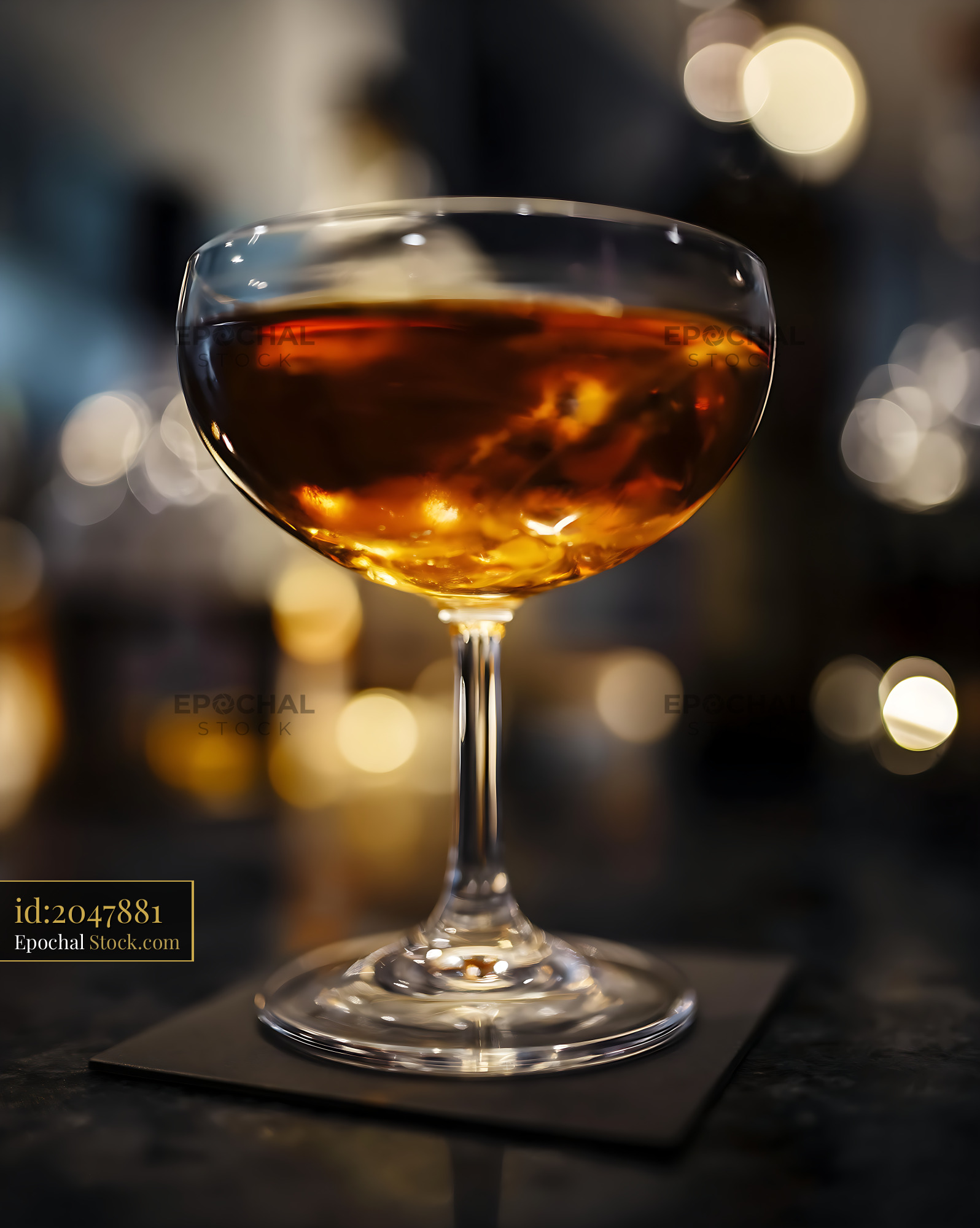 Bushwick Cocktail in Coupe Glass at Upscale Bar - stock photo