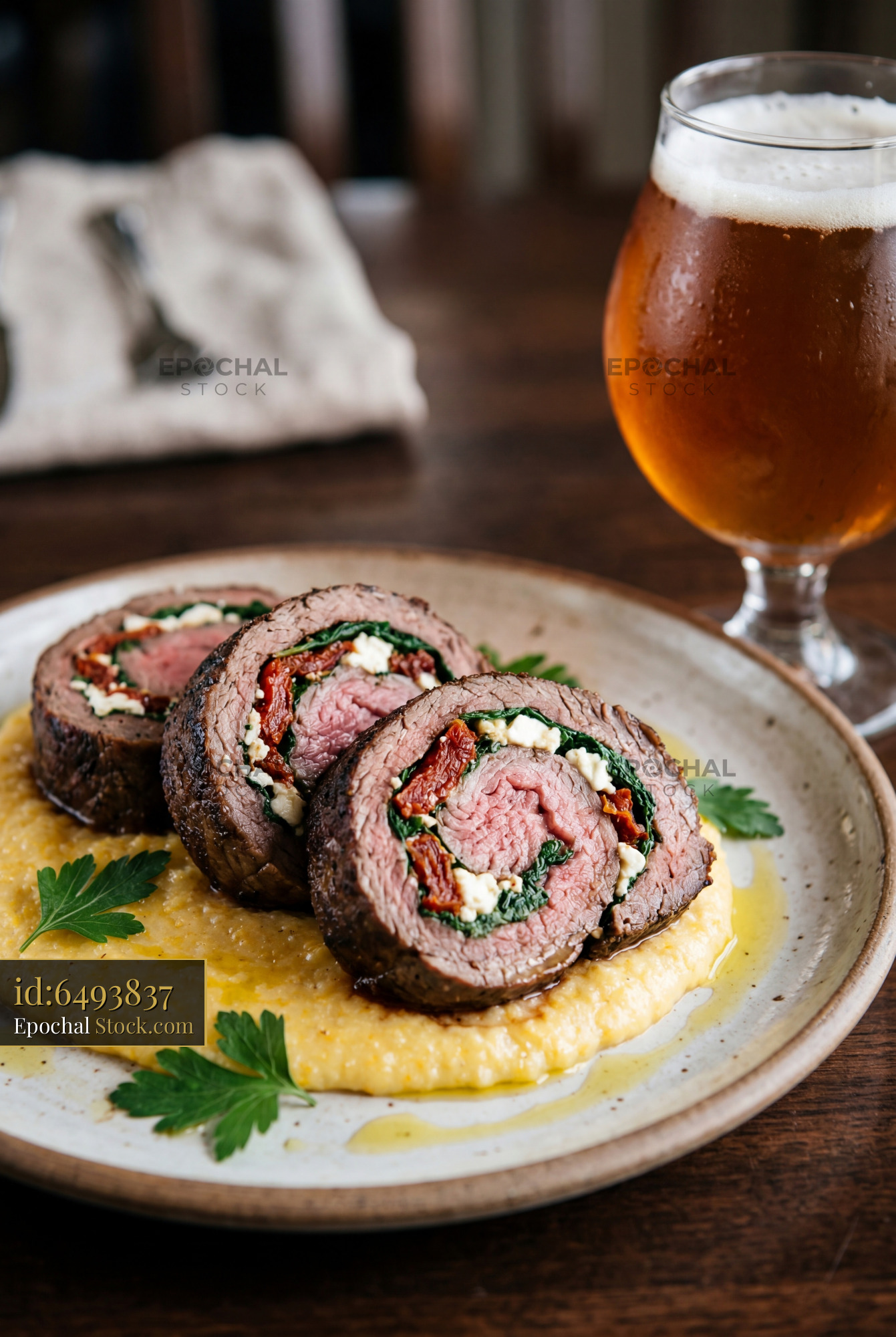 Beef Roulade with Polenta Puree and Beer - stock photo